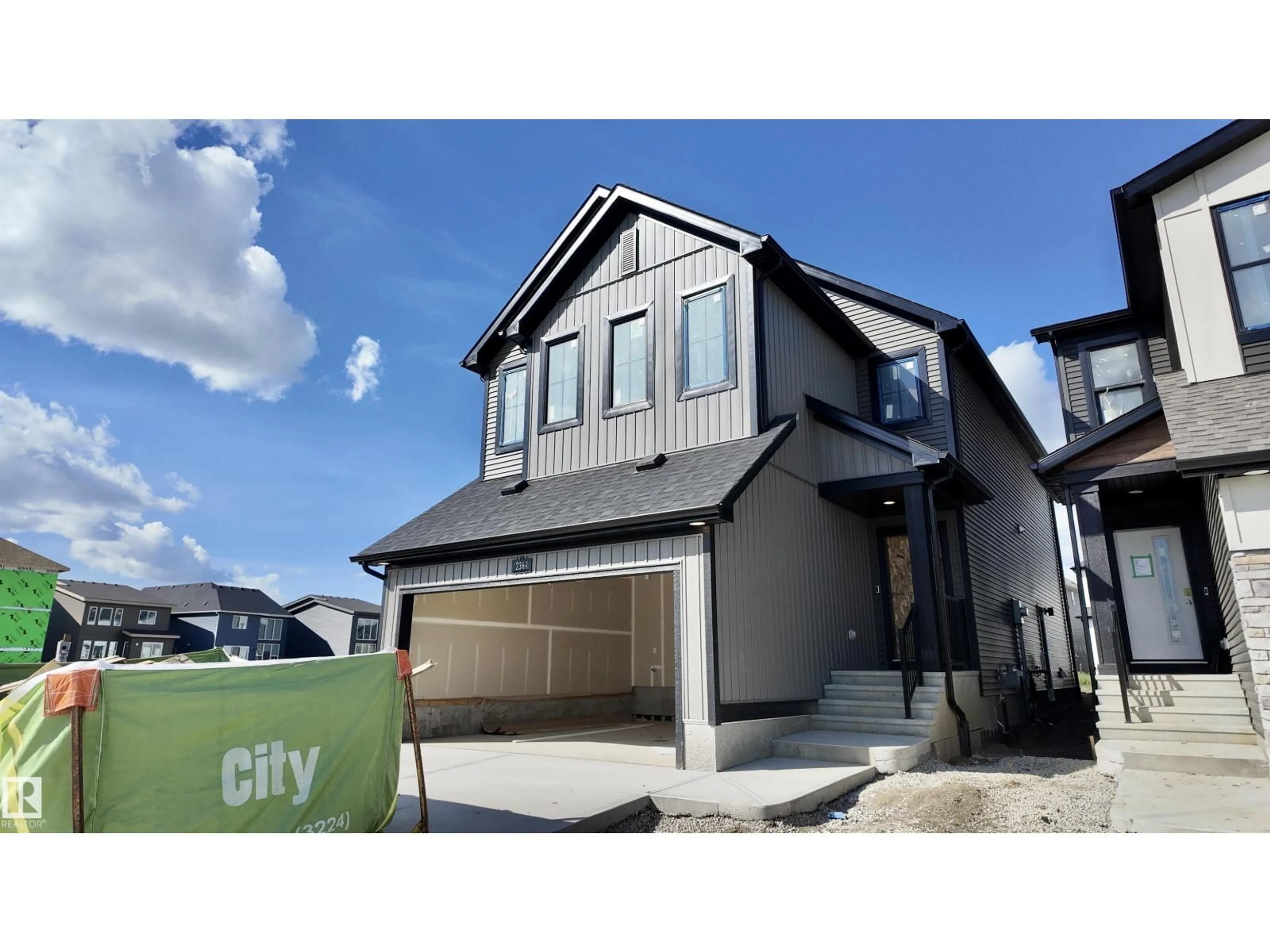 Home with vinyl exterior material, street for 2364 MUCKLEPLUM WY, Edmonton Alberta T6X3K1