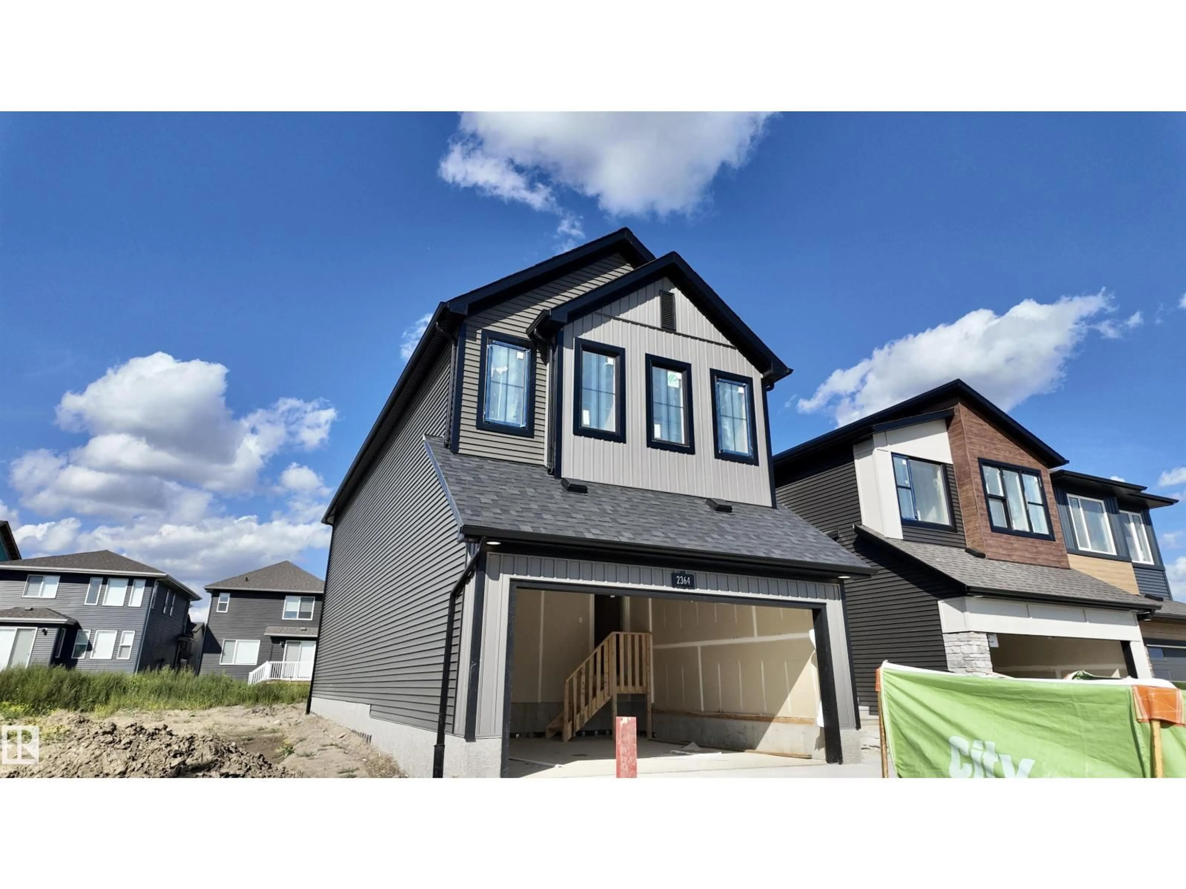 Home with vinyl exterior material, street for 2364 MUCKLEPLUM WY, Edmonton Alberta T6X3K1