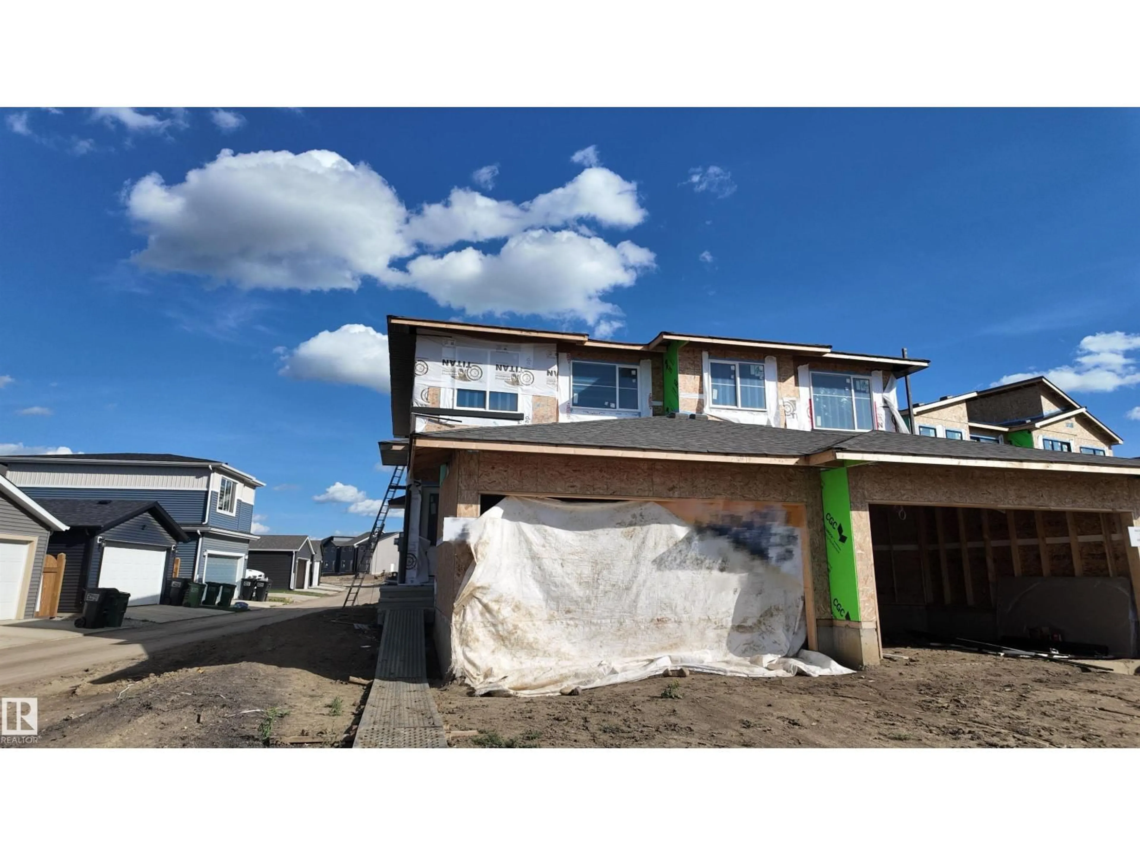 Home with vinyl exterior material, street for SW SW - 5621 HAWTHORN WY, Edmonton Alberta T4H1X9