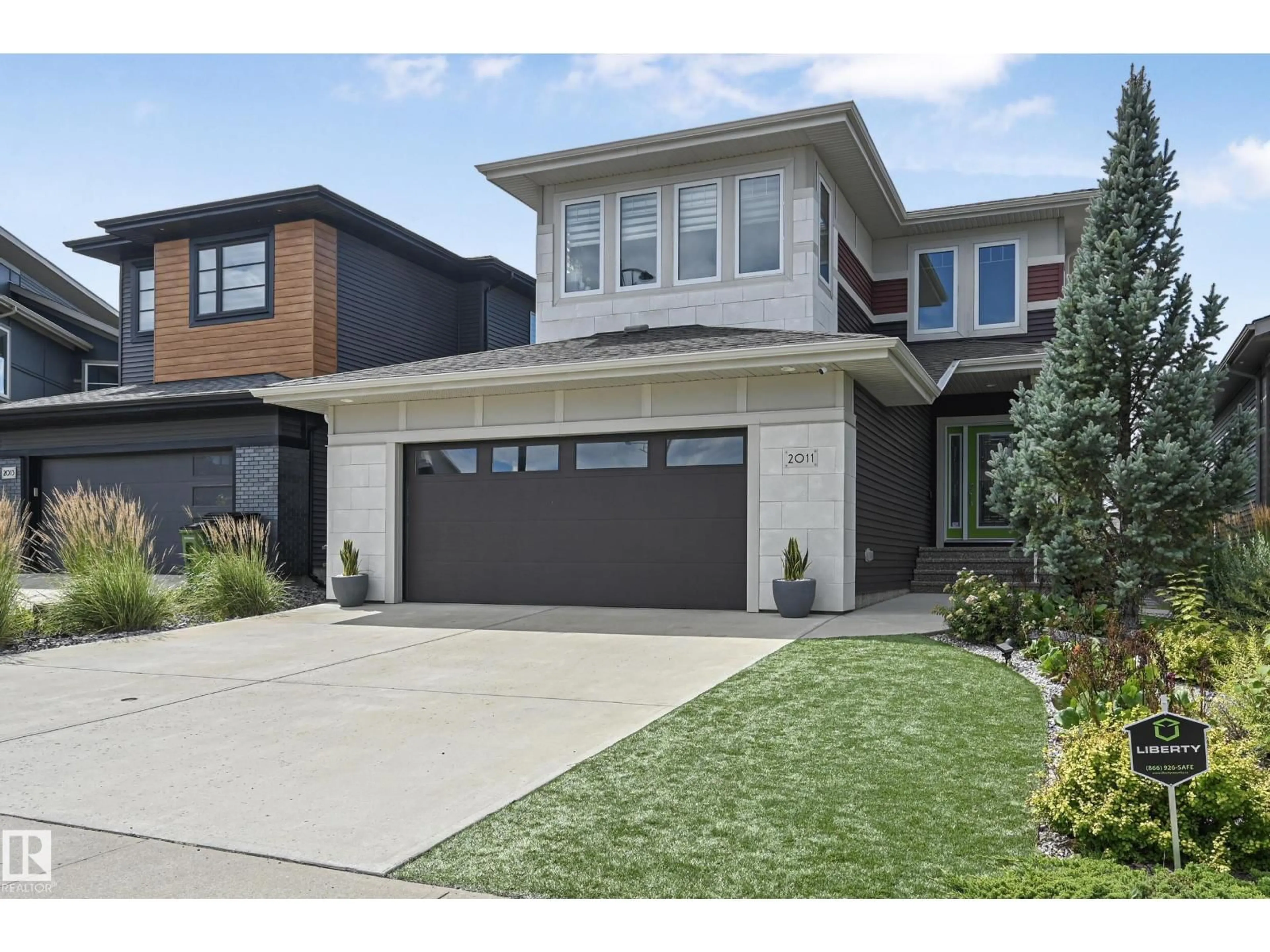 Home with brick exterior material, street for 2011 WARE RD, Edmonton Alberta T6W3G5