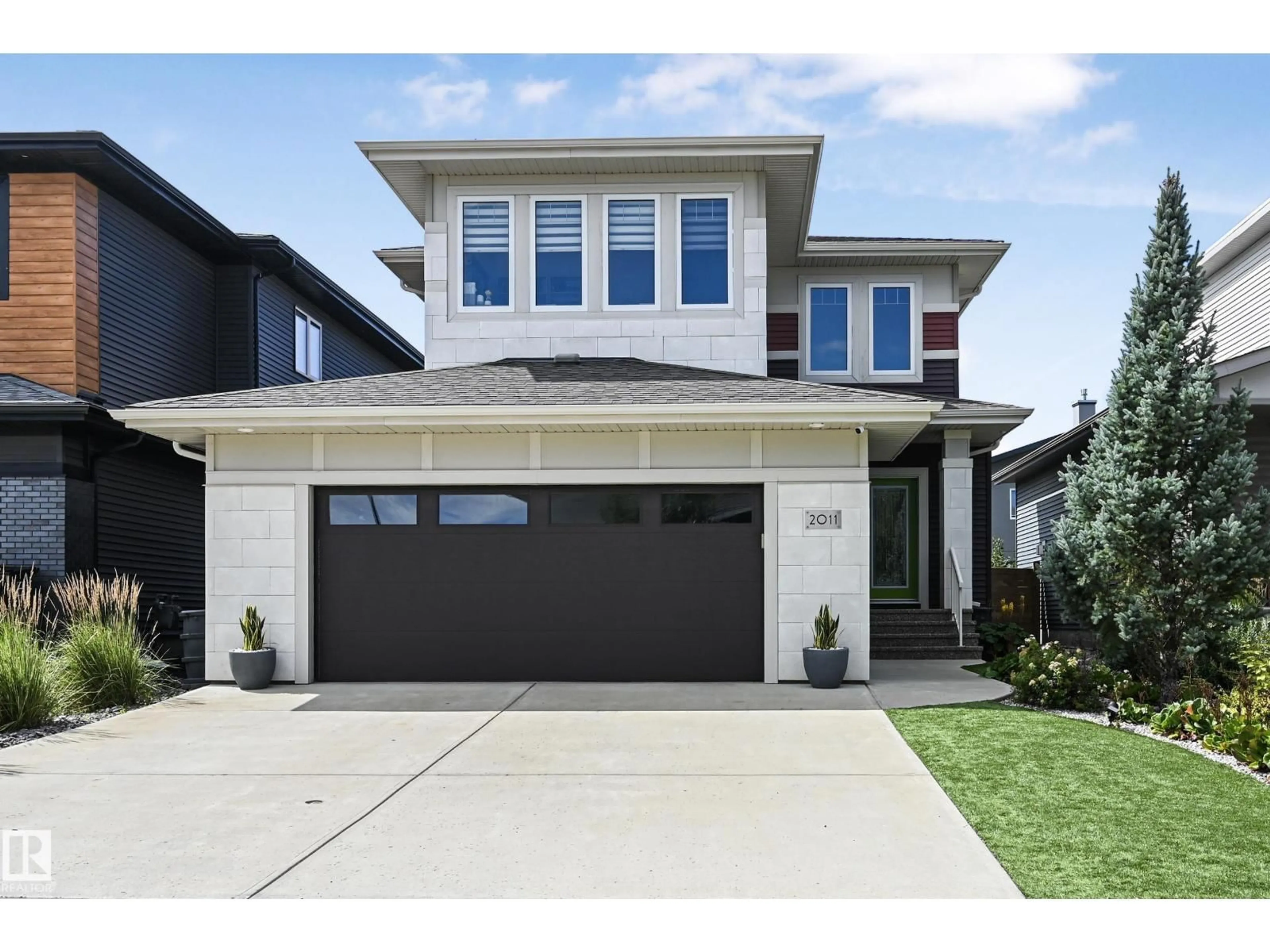 Home with vinyl exterior material, street for 2011 WARE RD, Edmonton Alberta T6W3G5