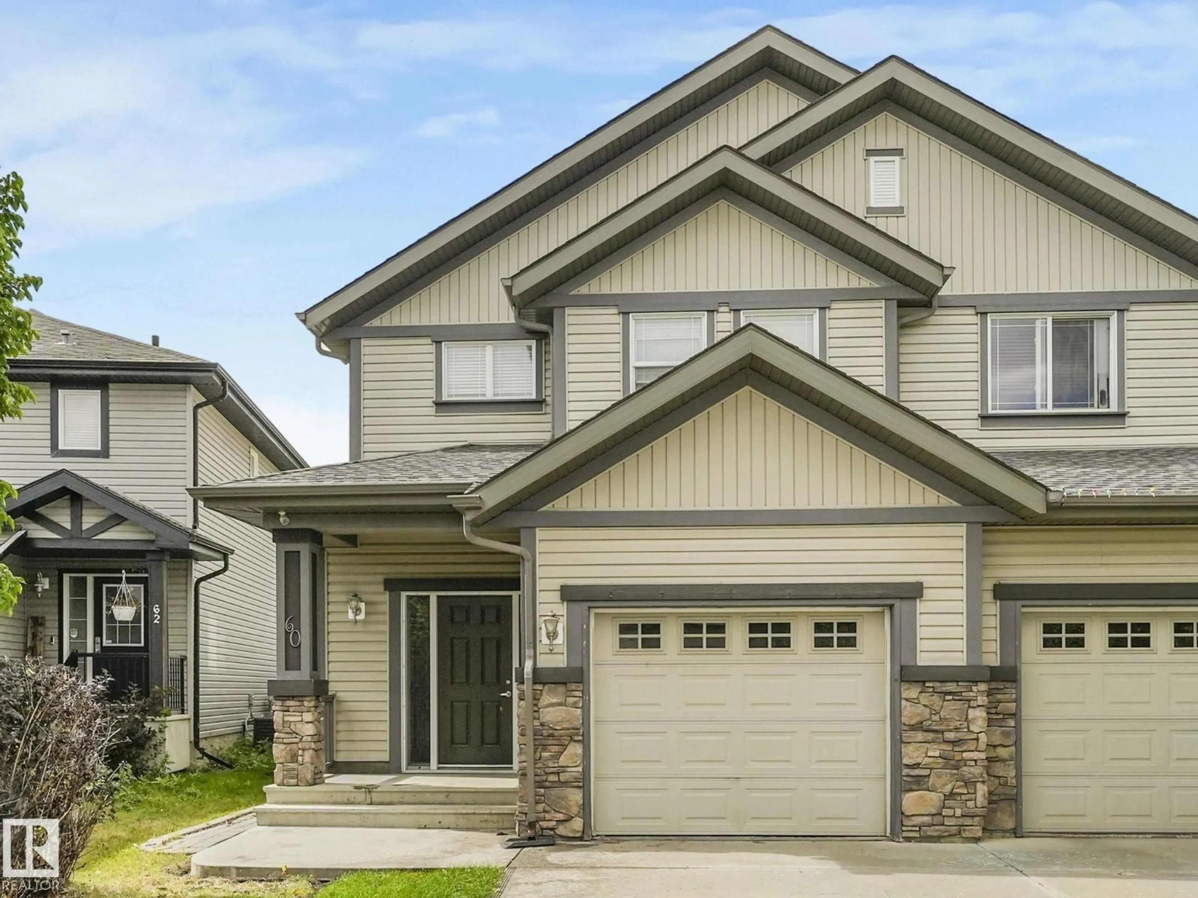 Home with vinyl exterior material, street for 60 CALVERT WD, Fort Saskatchewan Alberta T8L0C3