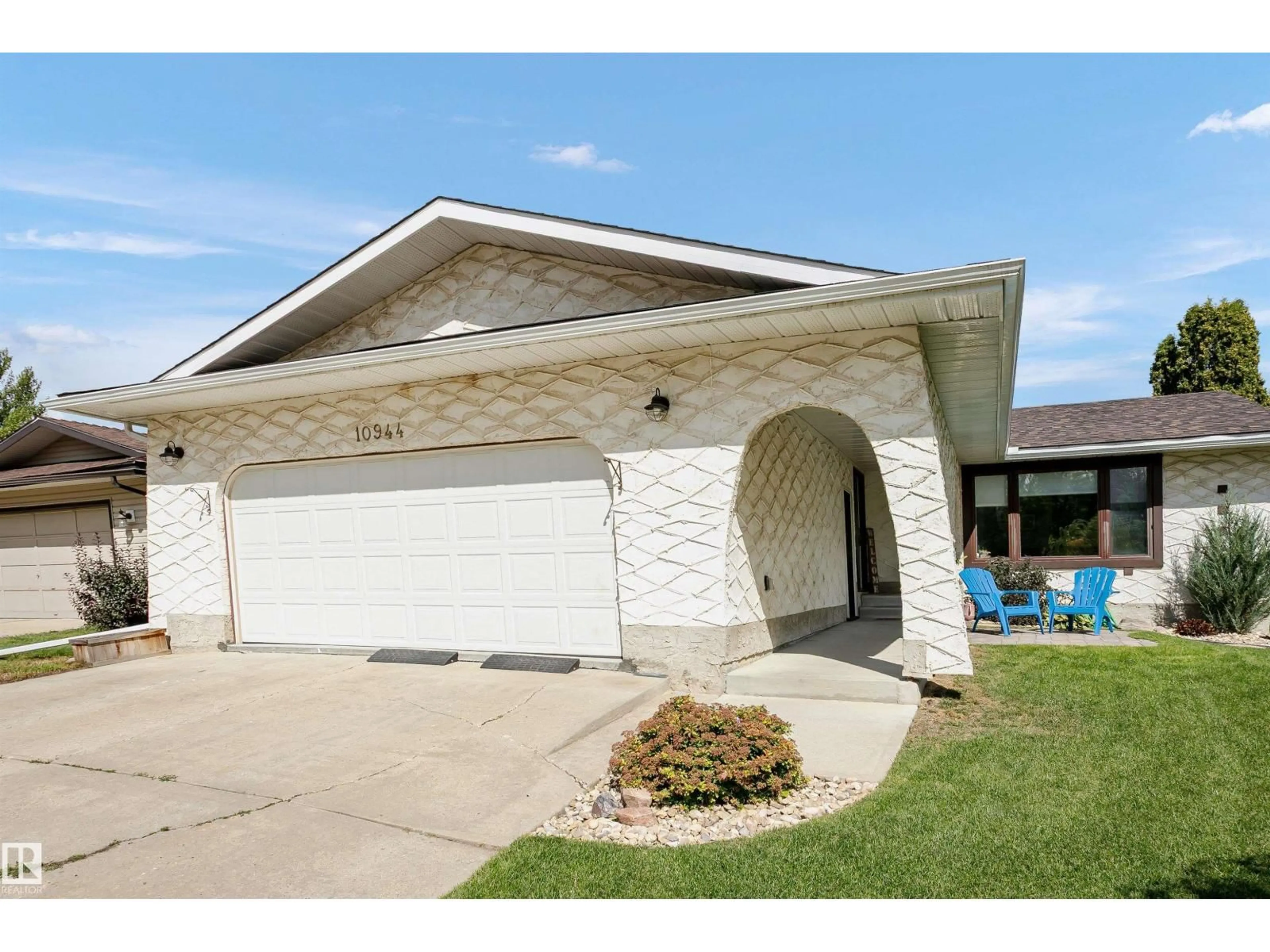 Home with vinyl exterior material, street for 10944 34A AV, Edmonton Alberta T6J2V1