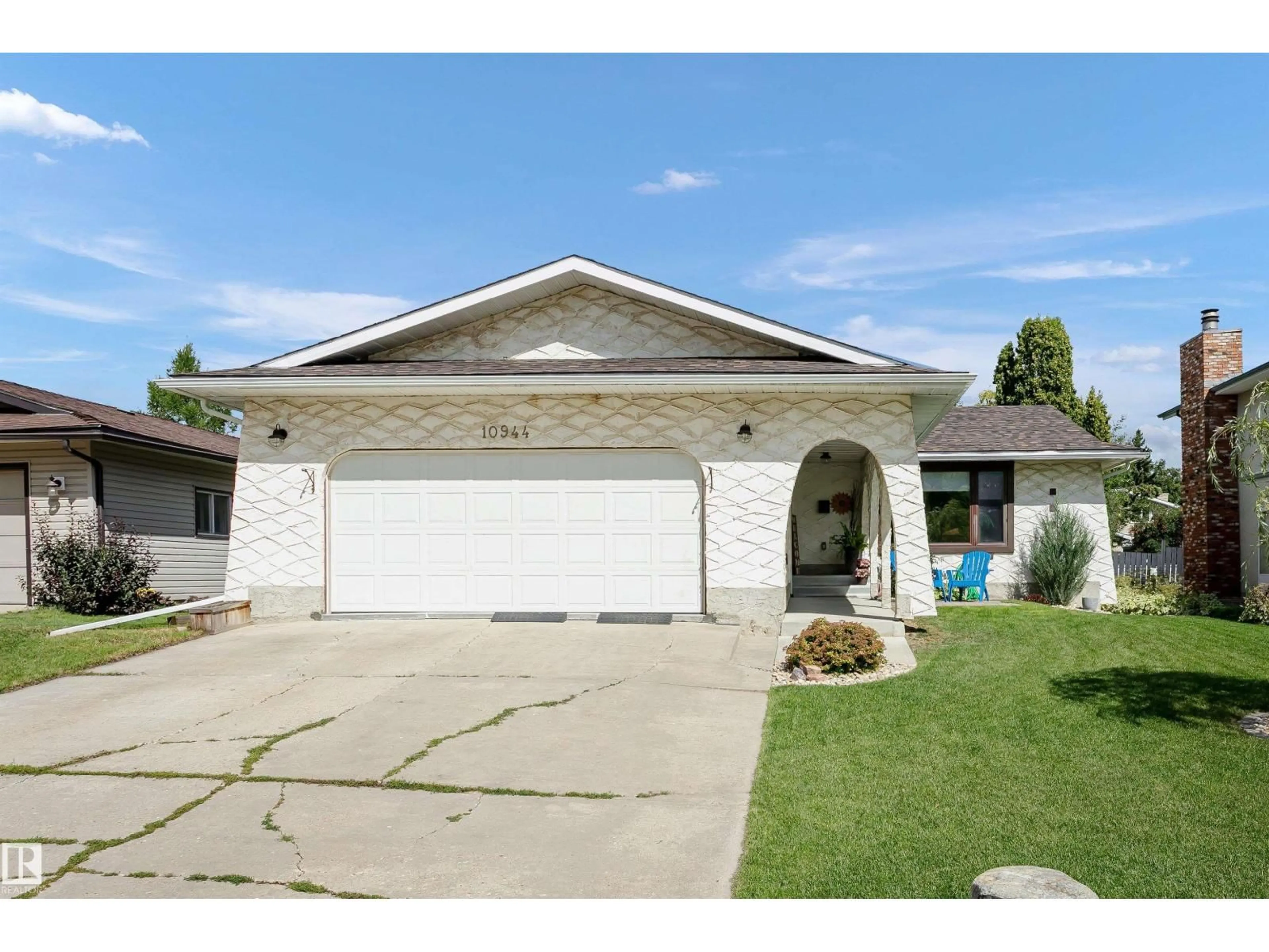 Home with vinyl exterior material, street for 10944 34A AV, Edmonton Alberta T6J2V1