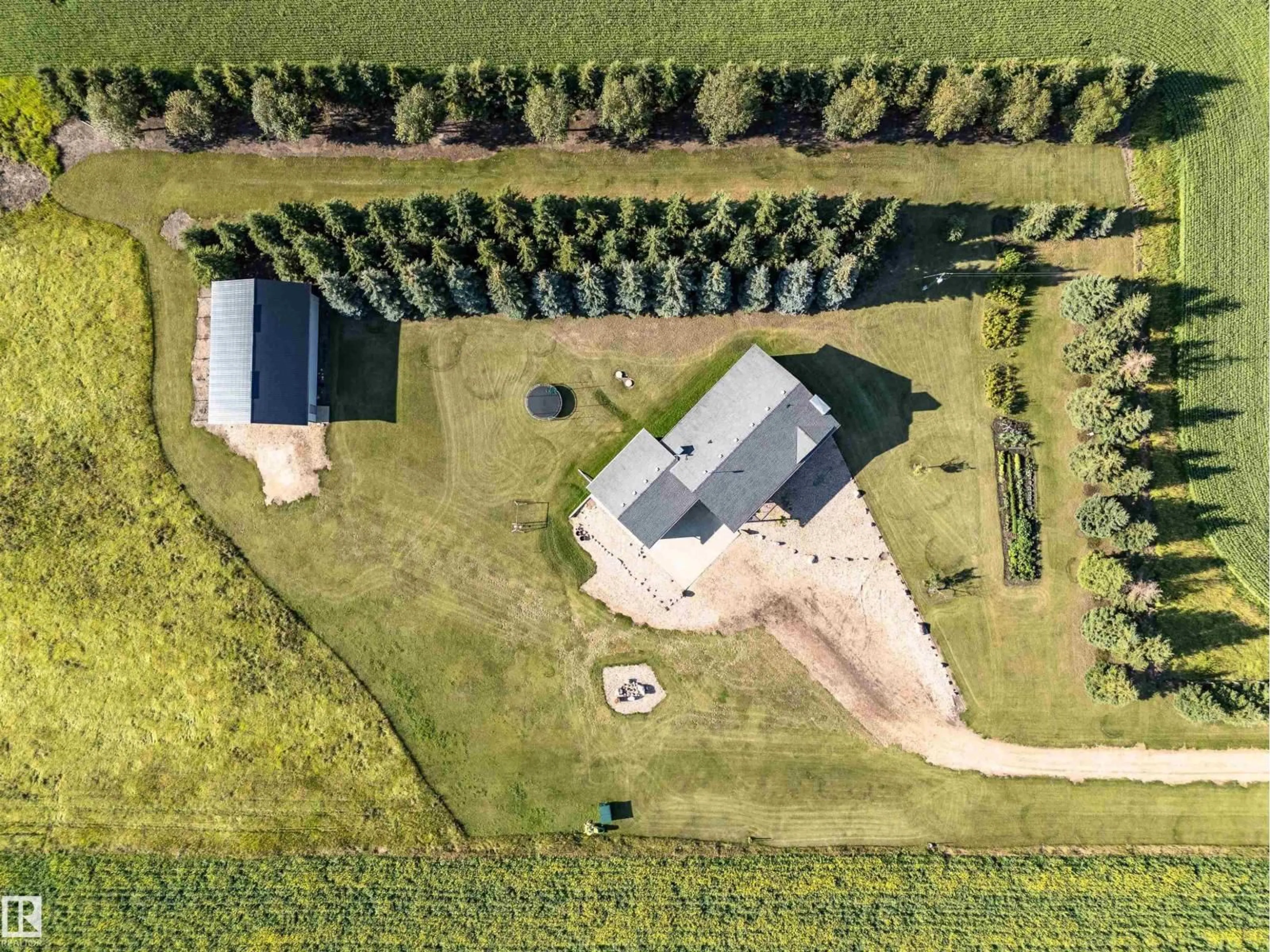 A pic from outside/outdoor area/front of a property/back of a property/a pic from drone, unknown for 50242 RGE ROAD 260, Rural Leduc County Alberta T9G0K7