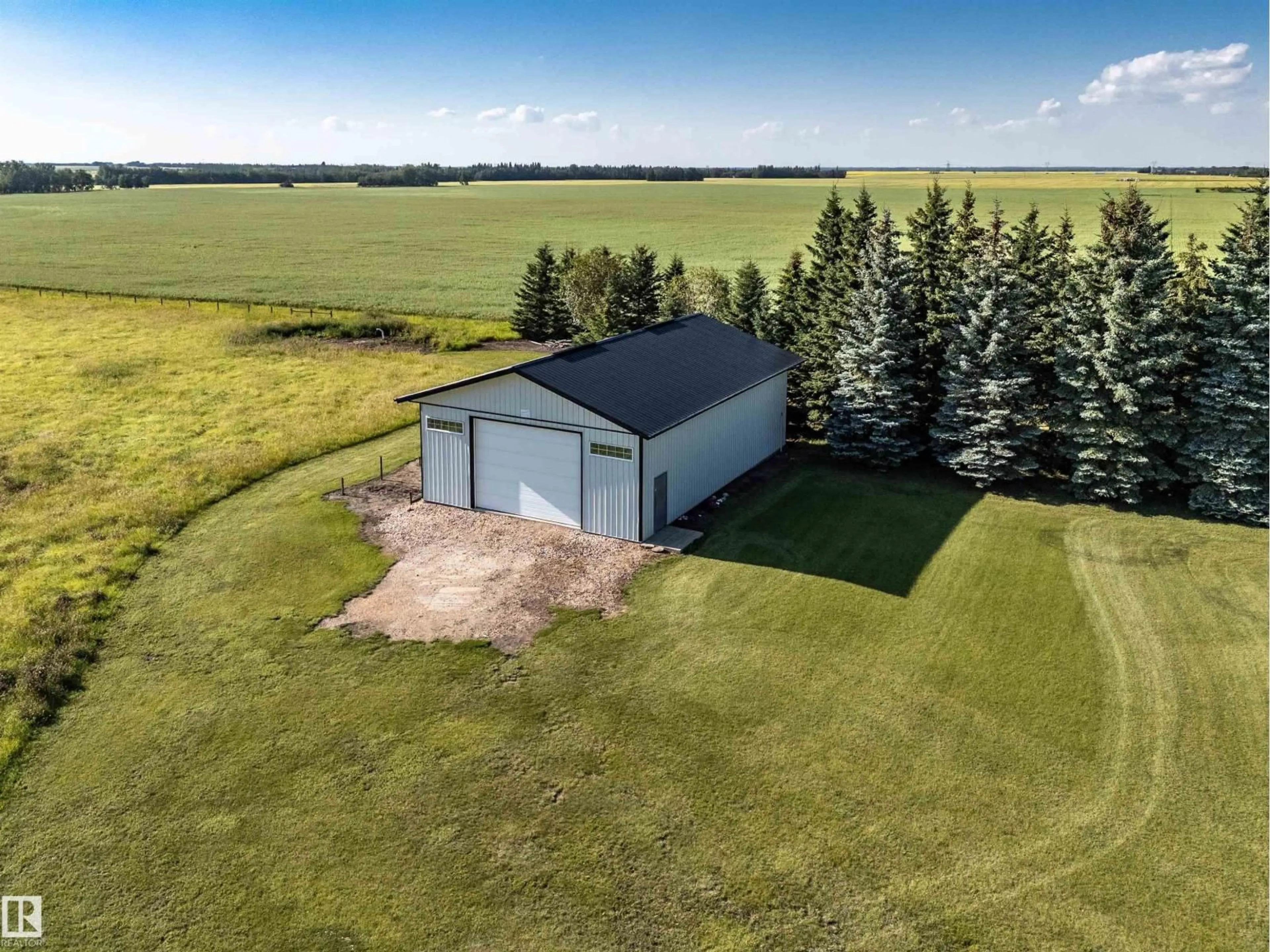 A pic from outside/outdoor area/front of a property/back of a property/a pic from drone, building for 50242 RGE ROAD 260, Rural Leduc County Alberta T9G0K7