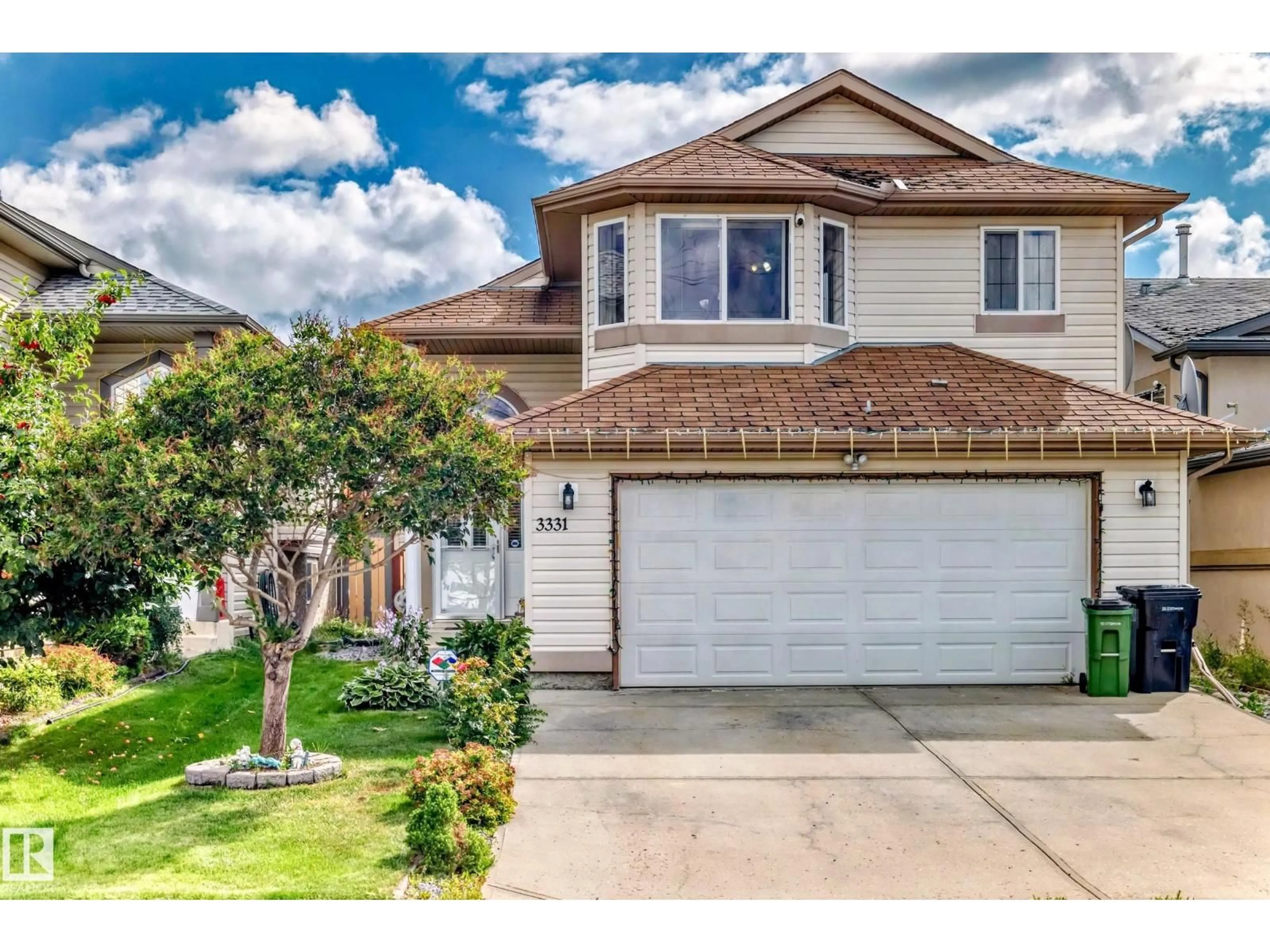 Home with vinyl exterior material, street for NW - 3331 26 ST, Edmonton Alberta T6T1Z4