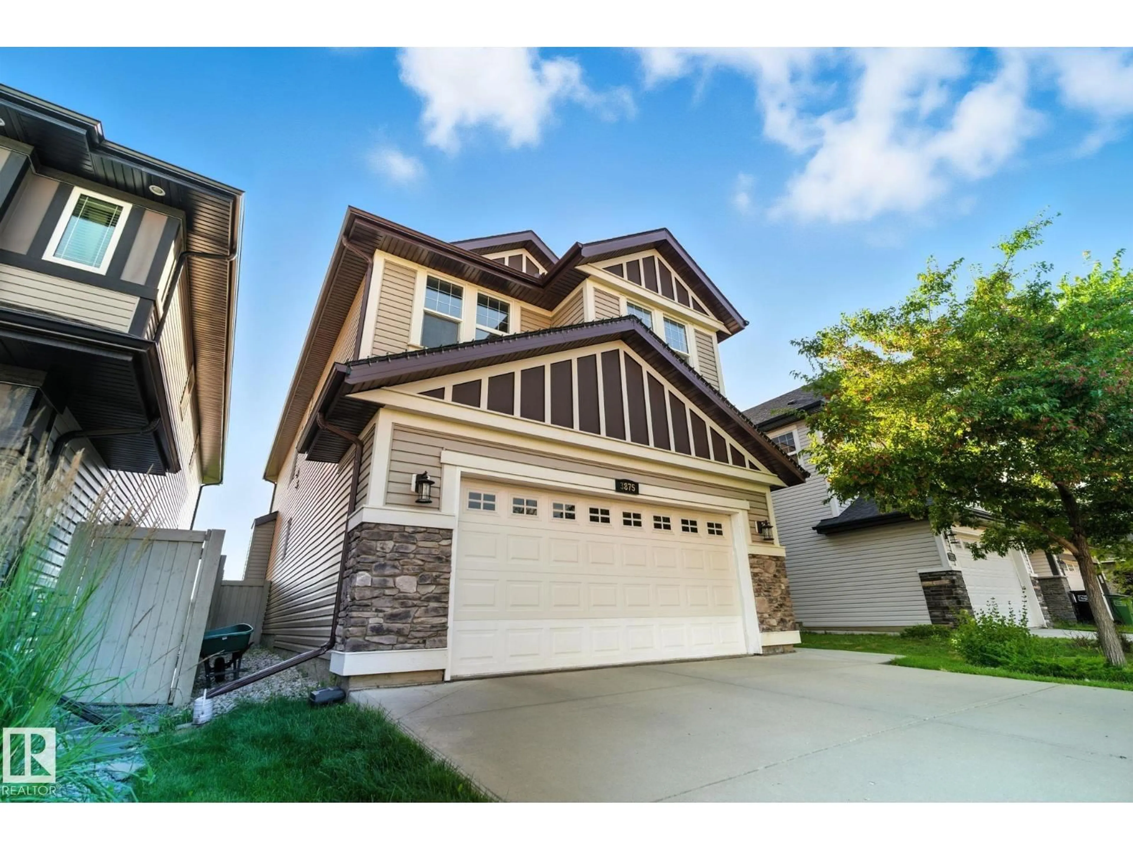 Home with vinyl exterior material, street for 3875 AGAR GREEN GR SW, Edmonton Alberta T6W2G3