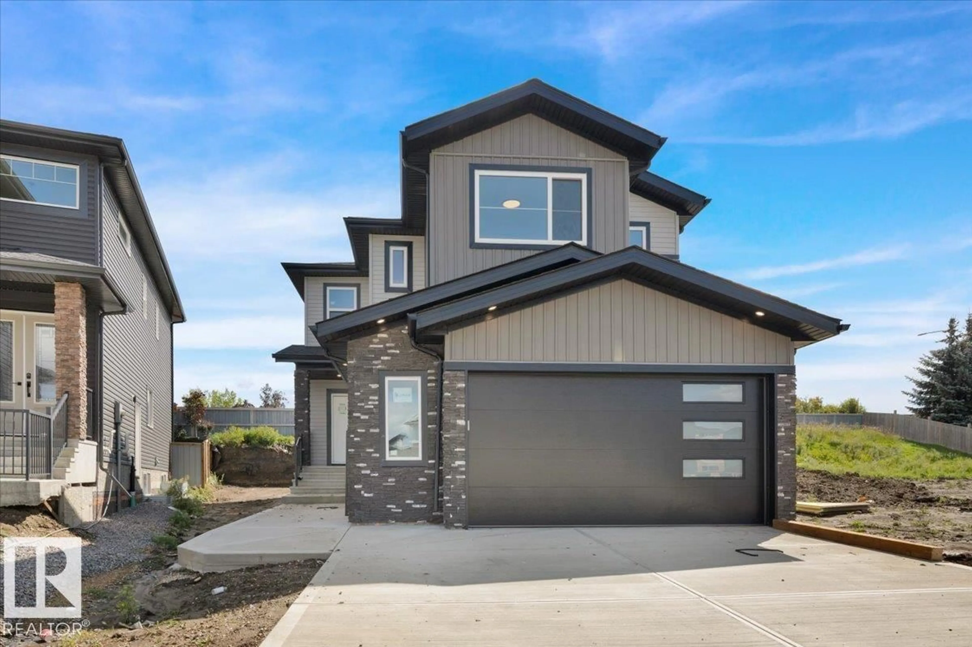 Home with brick exterior material, street for 51 HULL WYND, Spruce Grove Alberta T7X0X5
