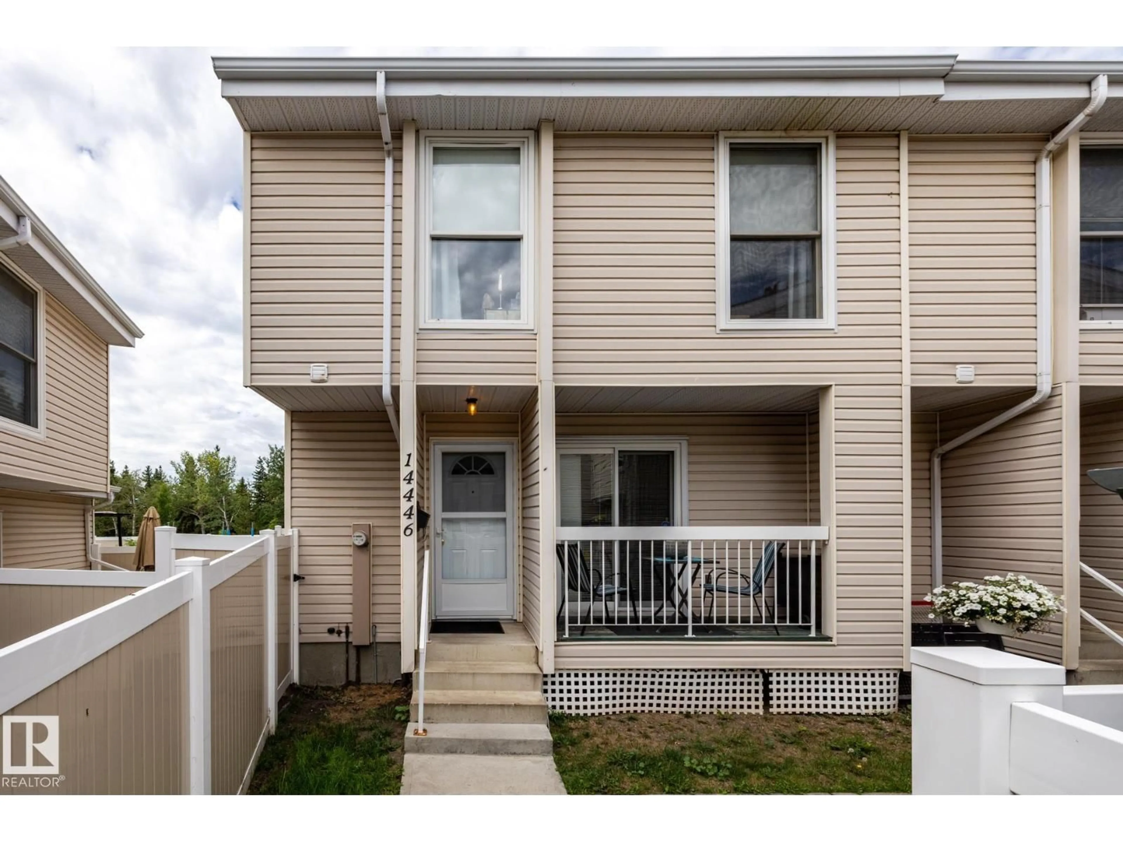 Home with vinyl exterior material, street for 14446 56 STREET, Edmonton Alberta T5A3R1