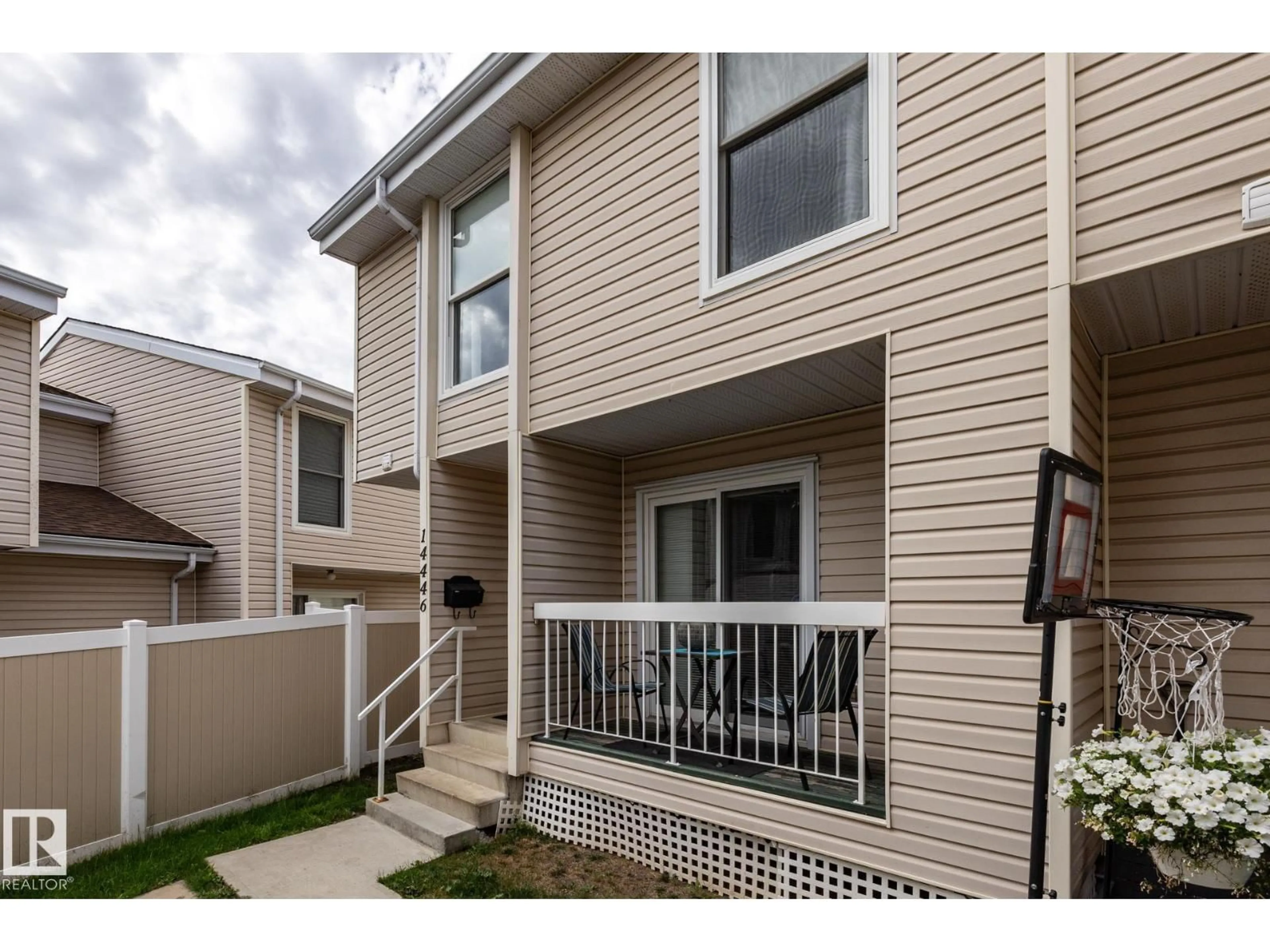 Home with vinyl exterior material, street for 14446 56 STREET, Edmonton Alberta T5A3R1