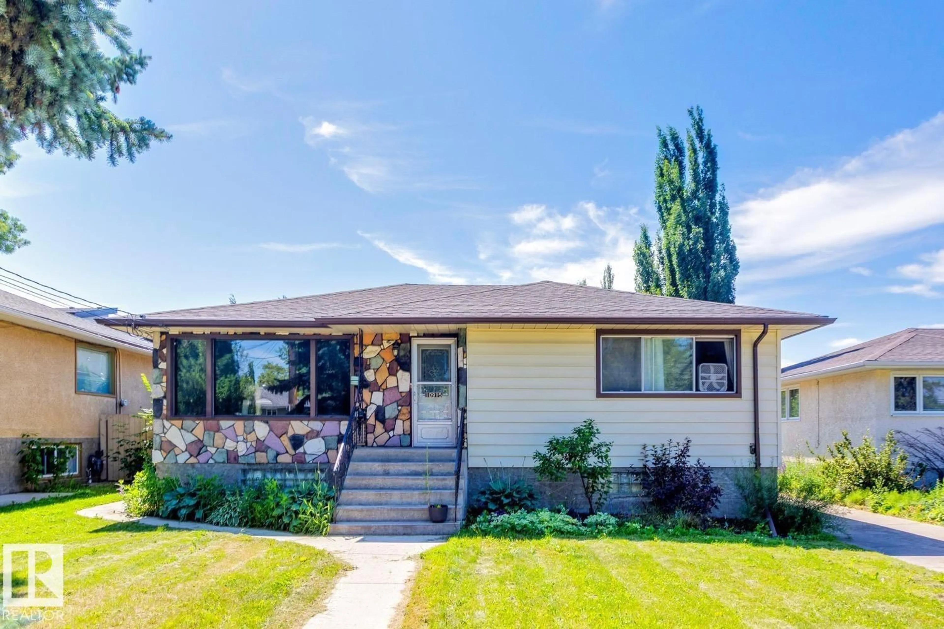 Home with vinyl exterior material, street for 10915 60 AV, Edmonton Alberta T6E1H8