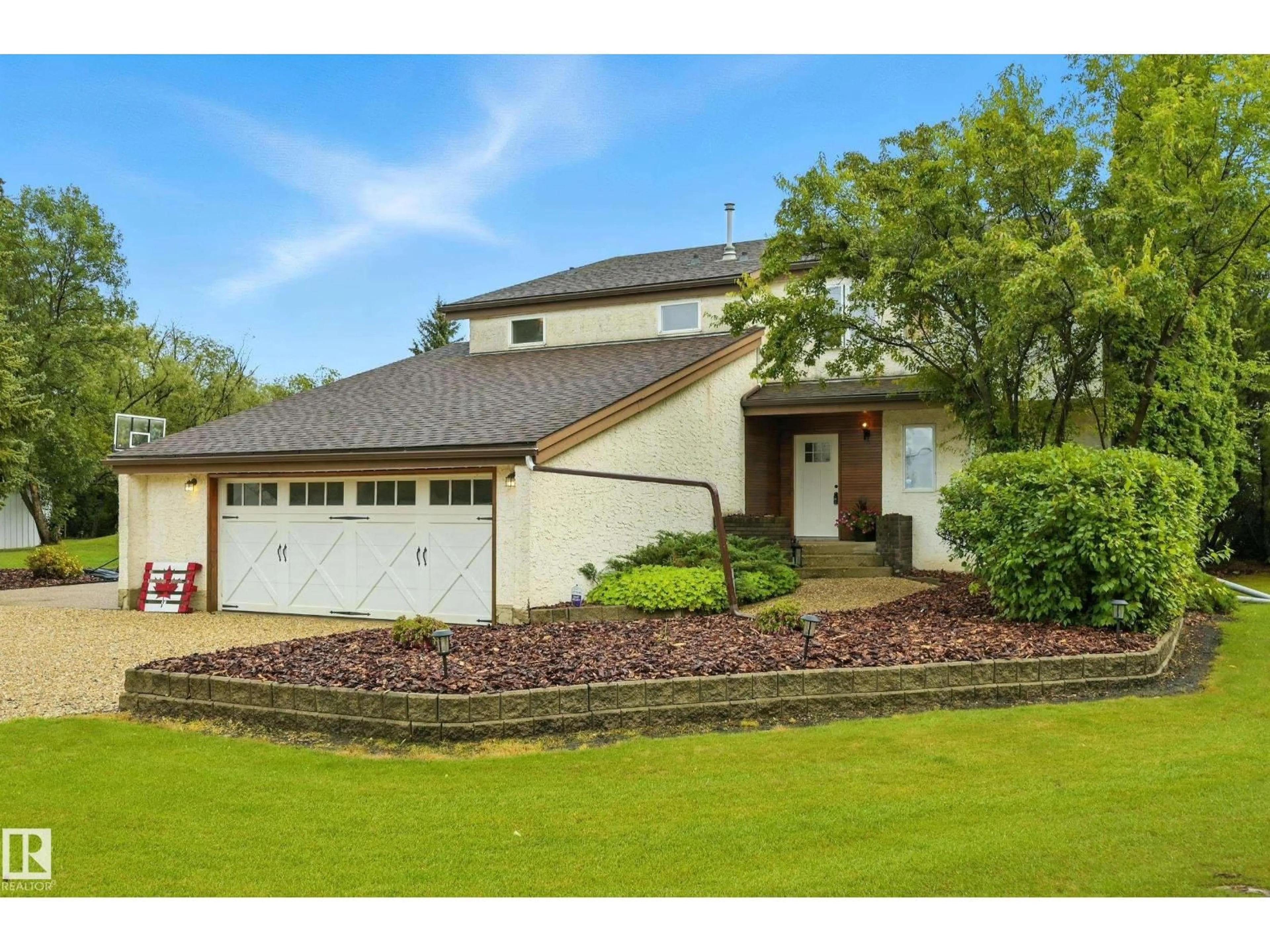 Home with vinyl exterior material, street for 1070 - 50242 RGE ROAD 244 A, Rural Leduc County Alberta T4X0P4