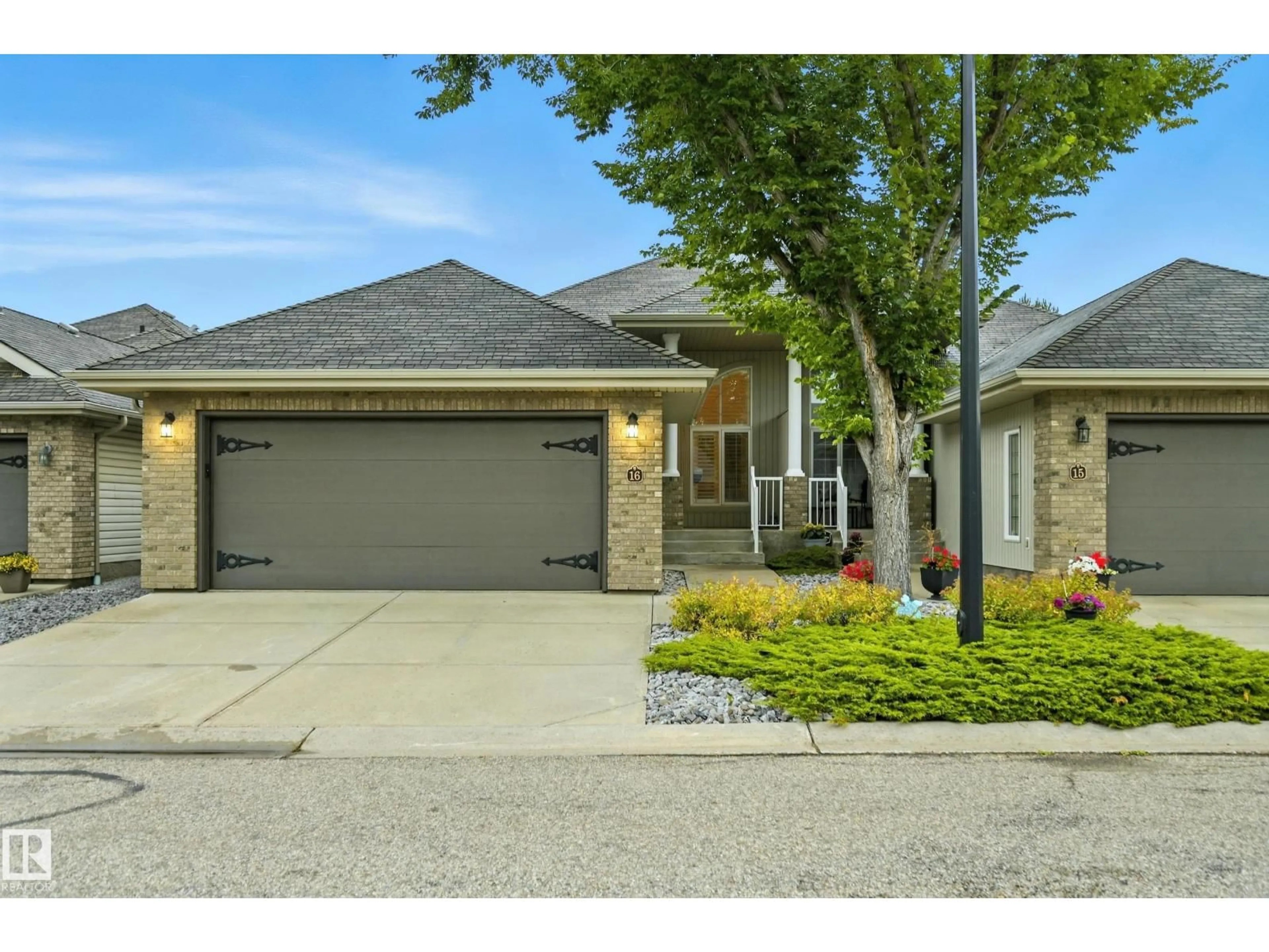 Home with brick exterior material, street for 16 10848 8 AV SW, Edmonton Alberta T6W1G5