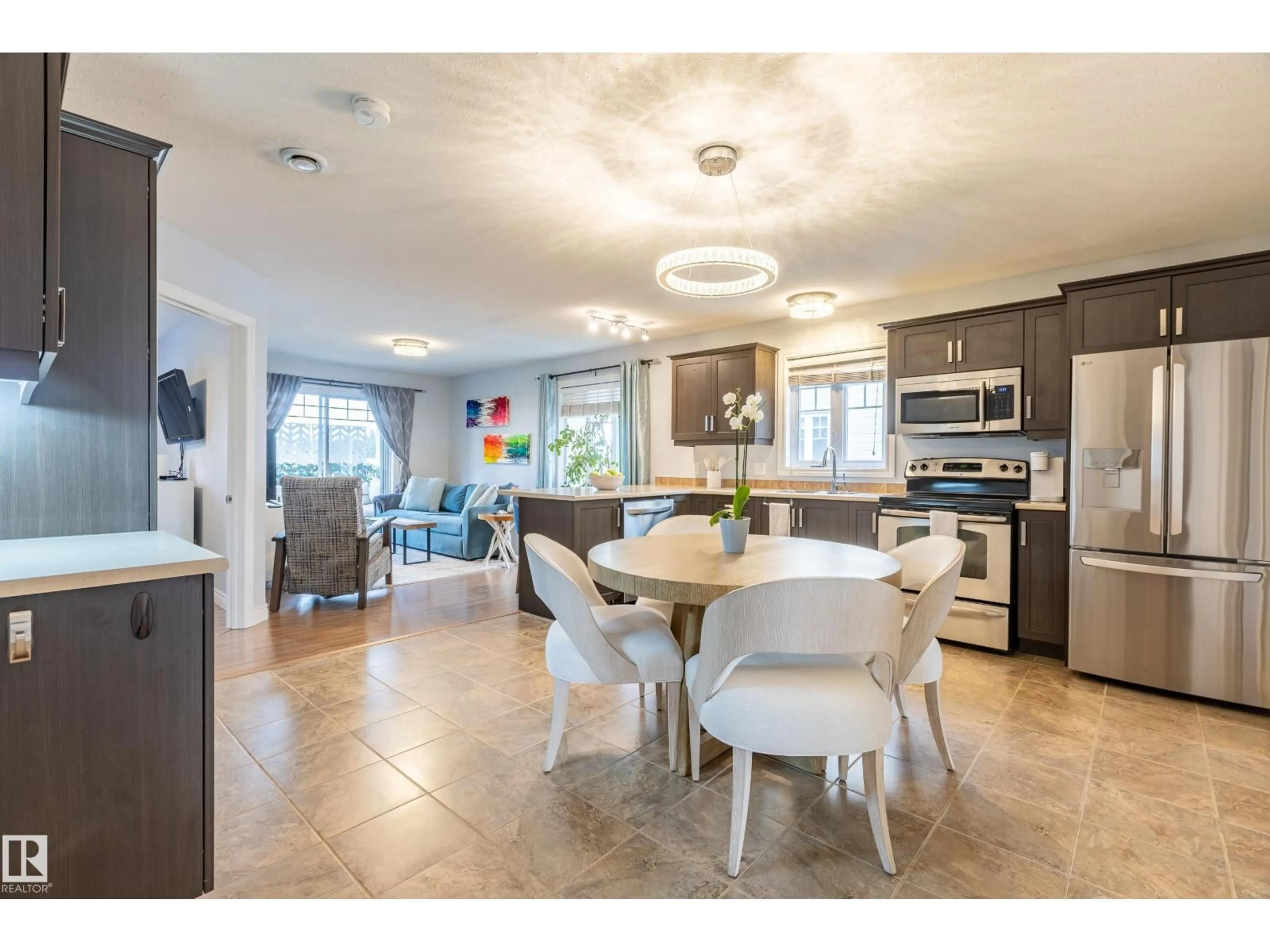 Open concept kitchen, ceramic/tile floor for 10 10105 101 AV, Morinville Alberta T8R1A6