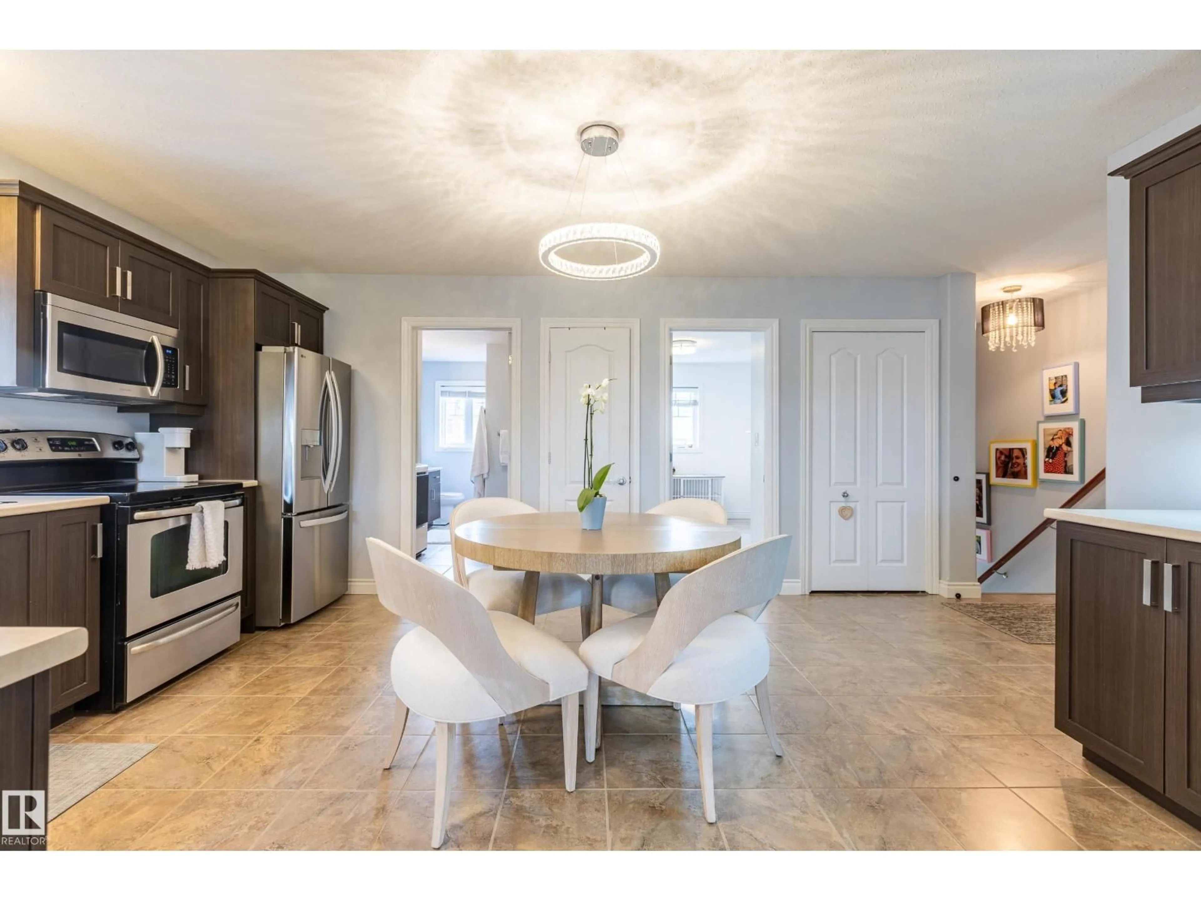 Open concept kitchen, ceramic/tile floor for 10 10105 101 AV, Morinville Alberta T8R1A6