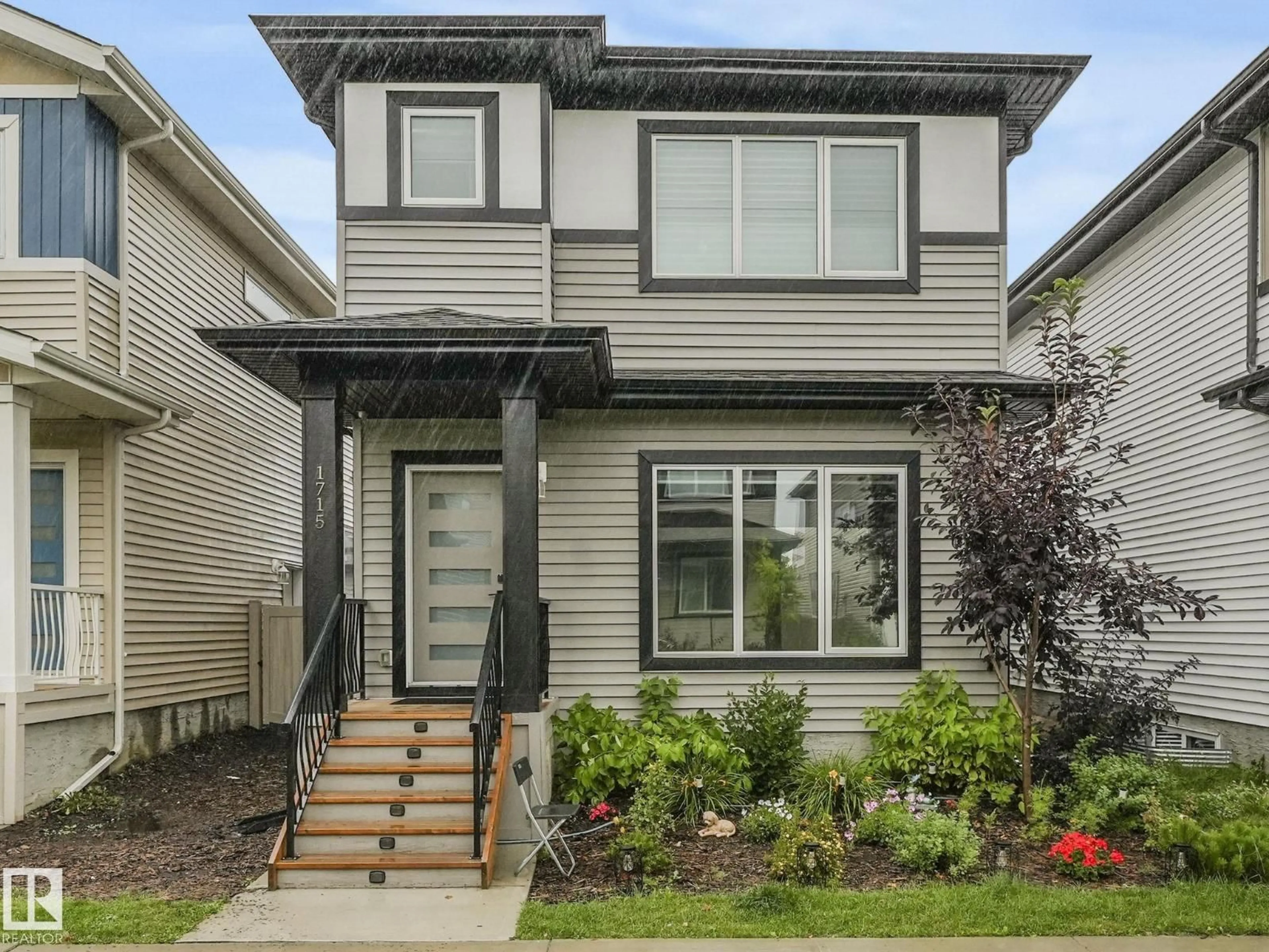 Home with vinyl exterior material, street for NW - 1715 26A ST, Edmonton Alberta T6T2H9