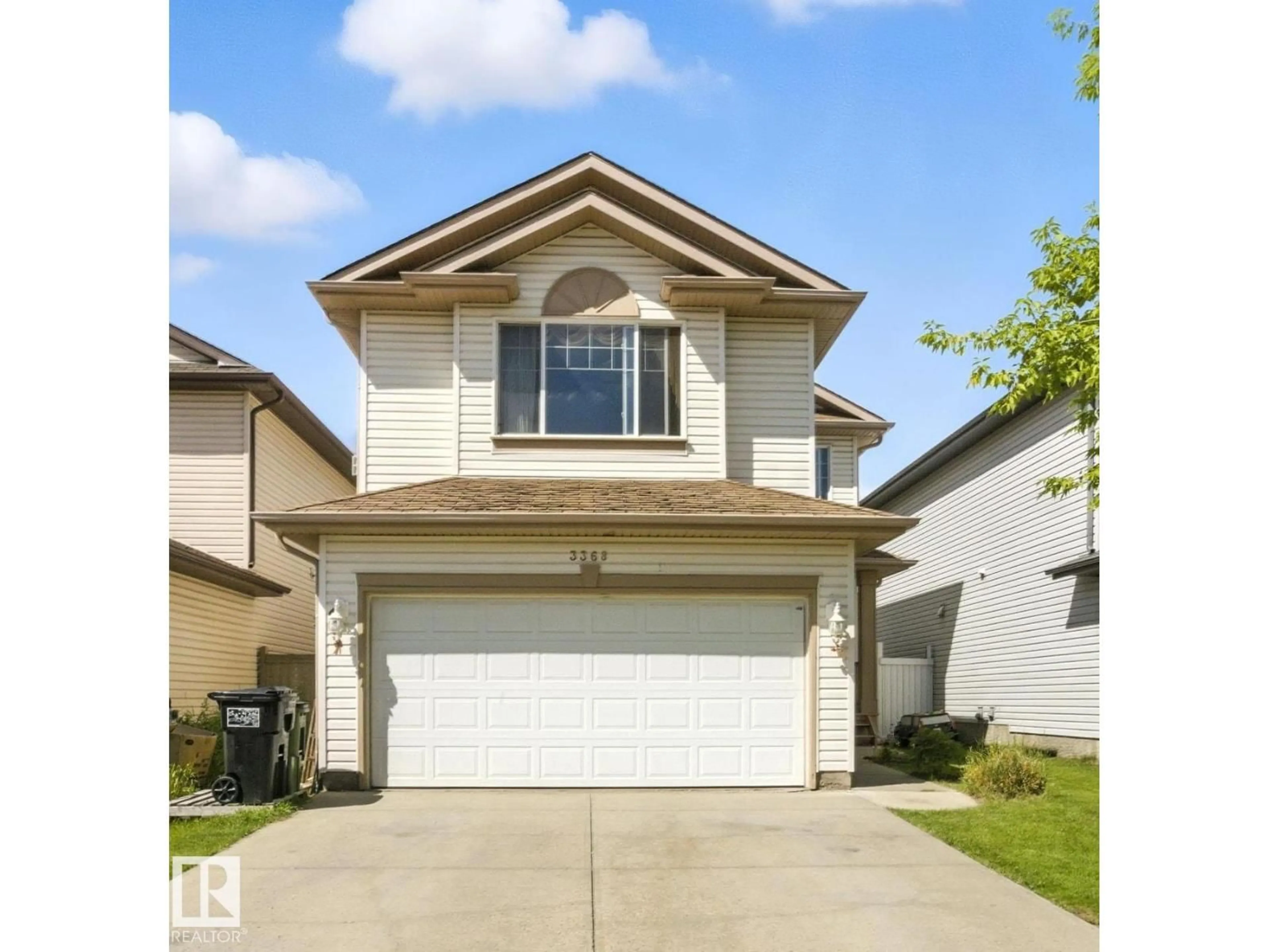 Home with vinyl exterior material, street for 3368 24 AV, Edmonton Alberta T6T1Y5