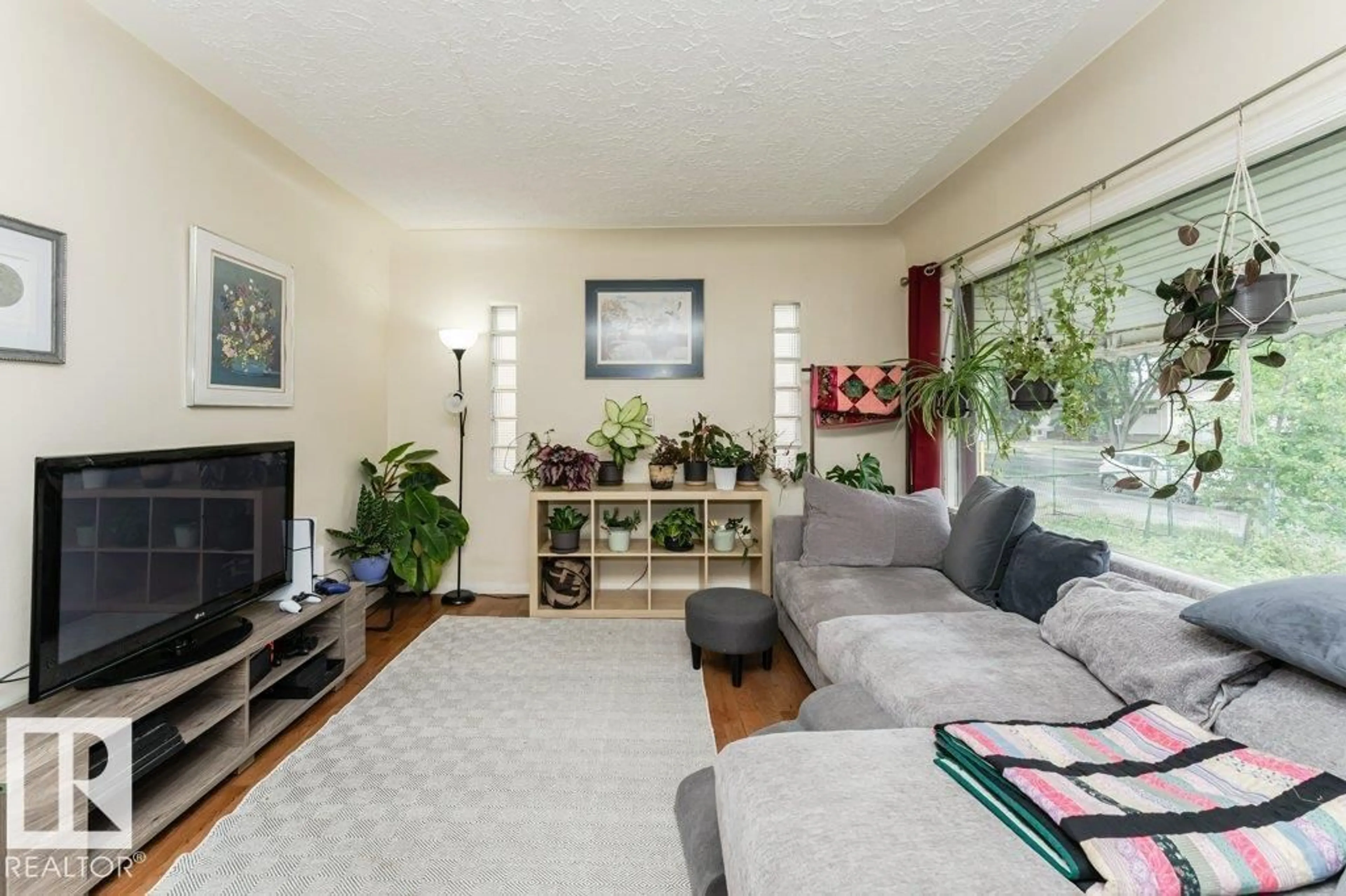 Living room with furniture, unknown for 6028 106 ST, Edmonton Alberta T6H2T7
