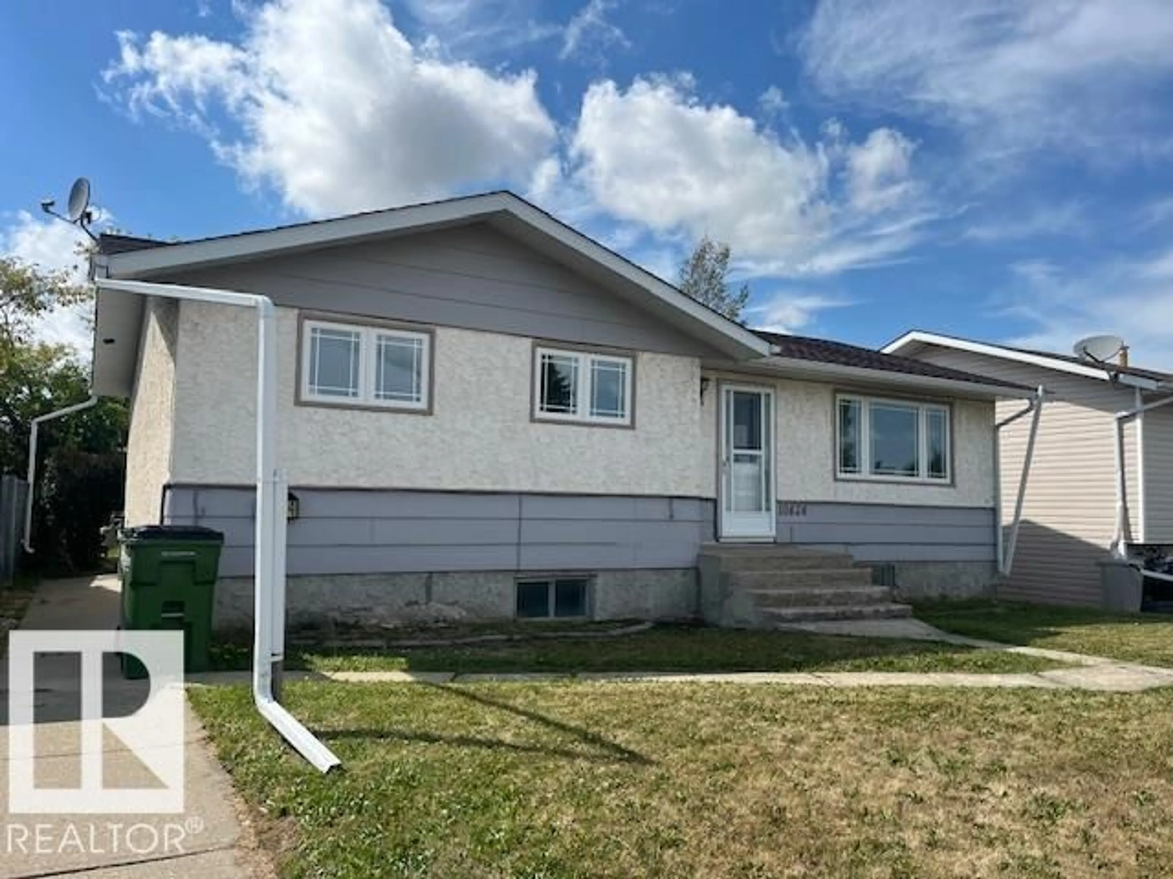 Home with vinyl exterior material, street for 10424 110 AV, Westlock Alberta T7P1G2