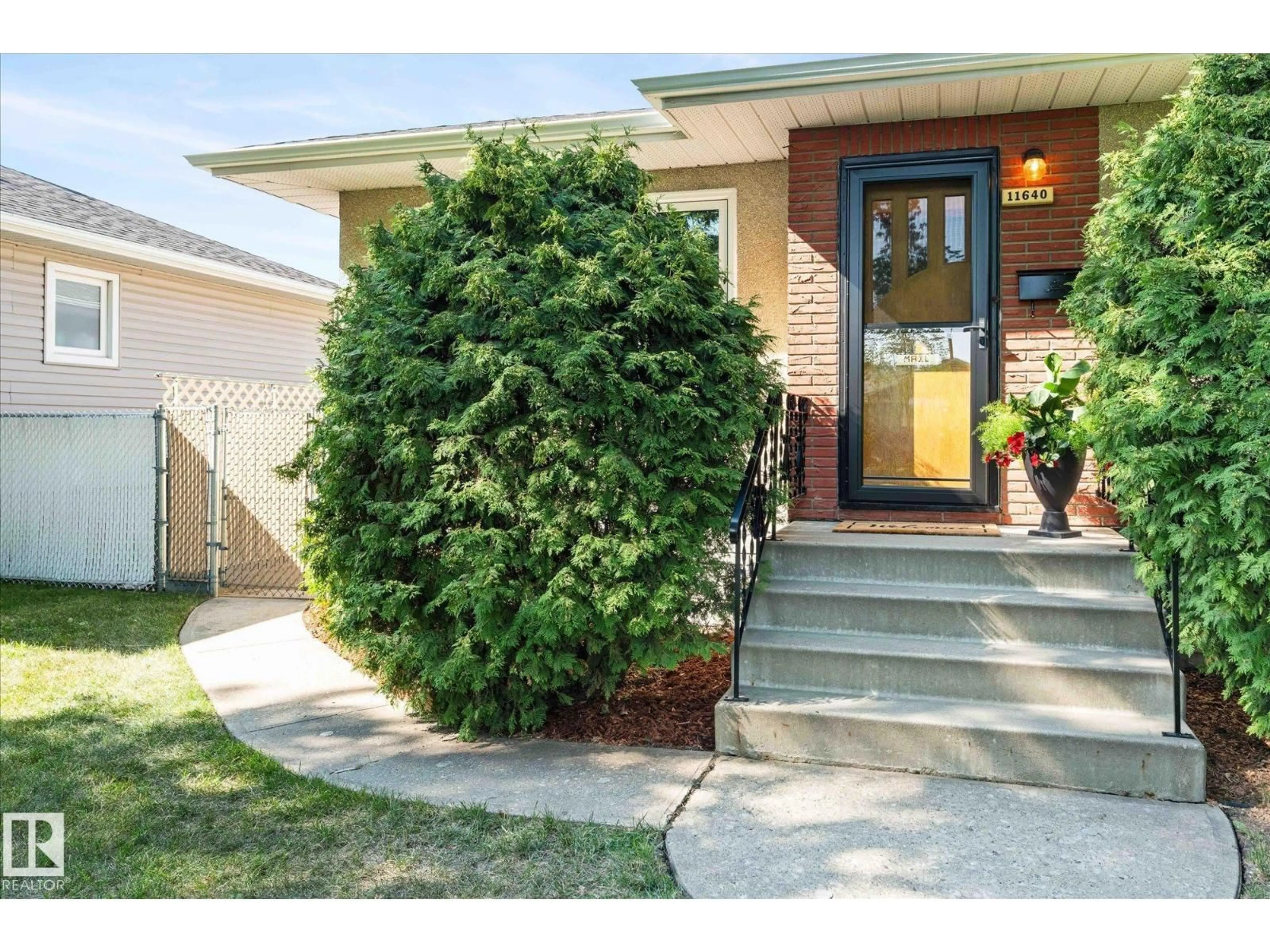 Home with brick exterior material, street for NW - 11640 136 ST, Edmonton Alberta T5M1M8