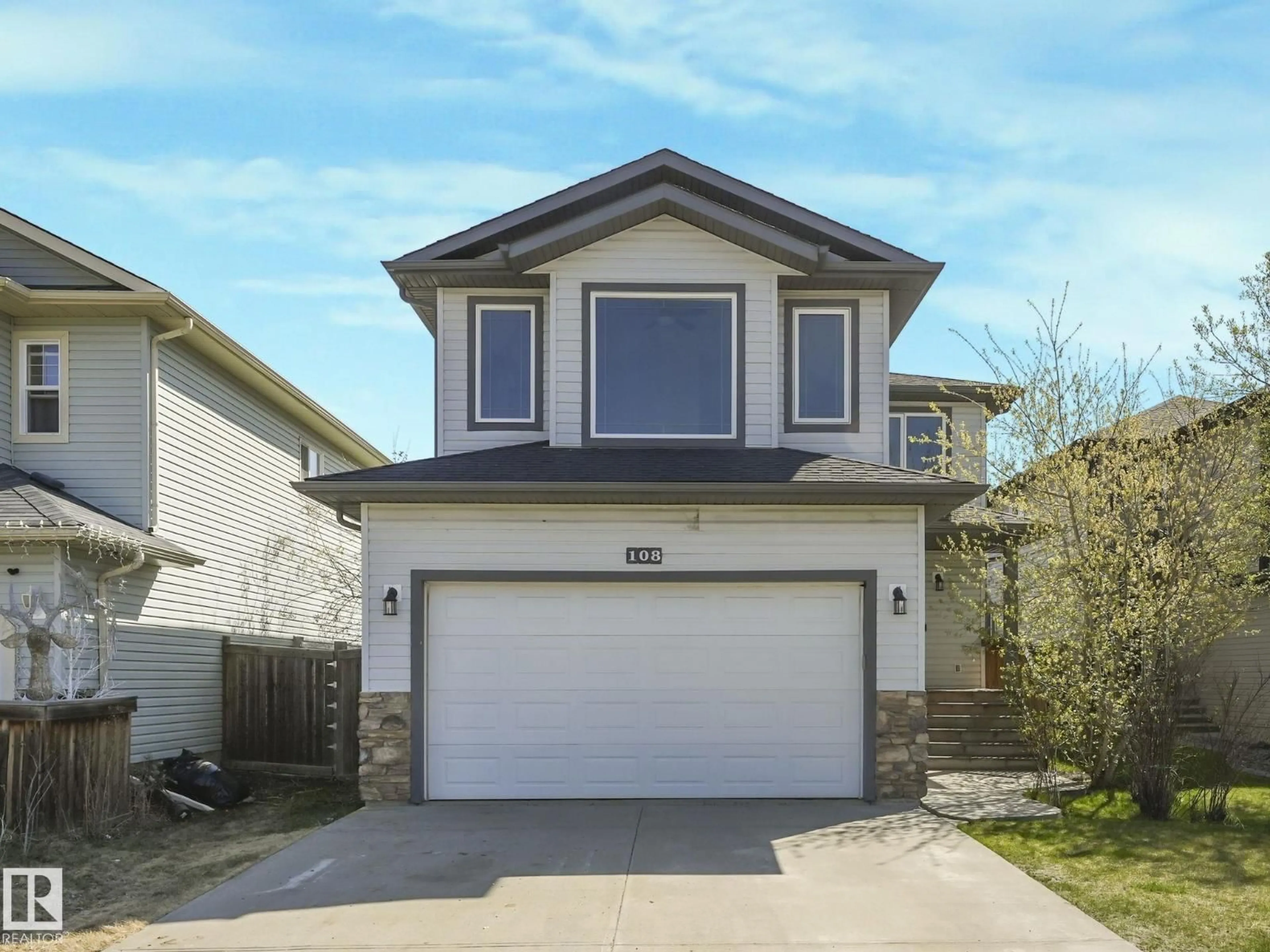Home with vinyl exterior material, street for 108 LAMPLIGHT DR, Spruce Grove Alberta T7X0G8