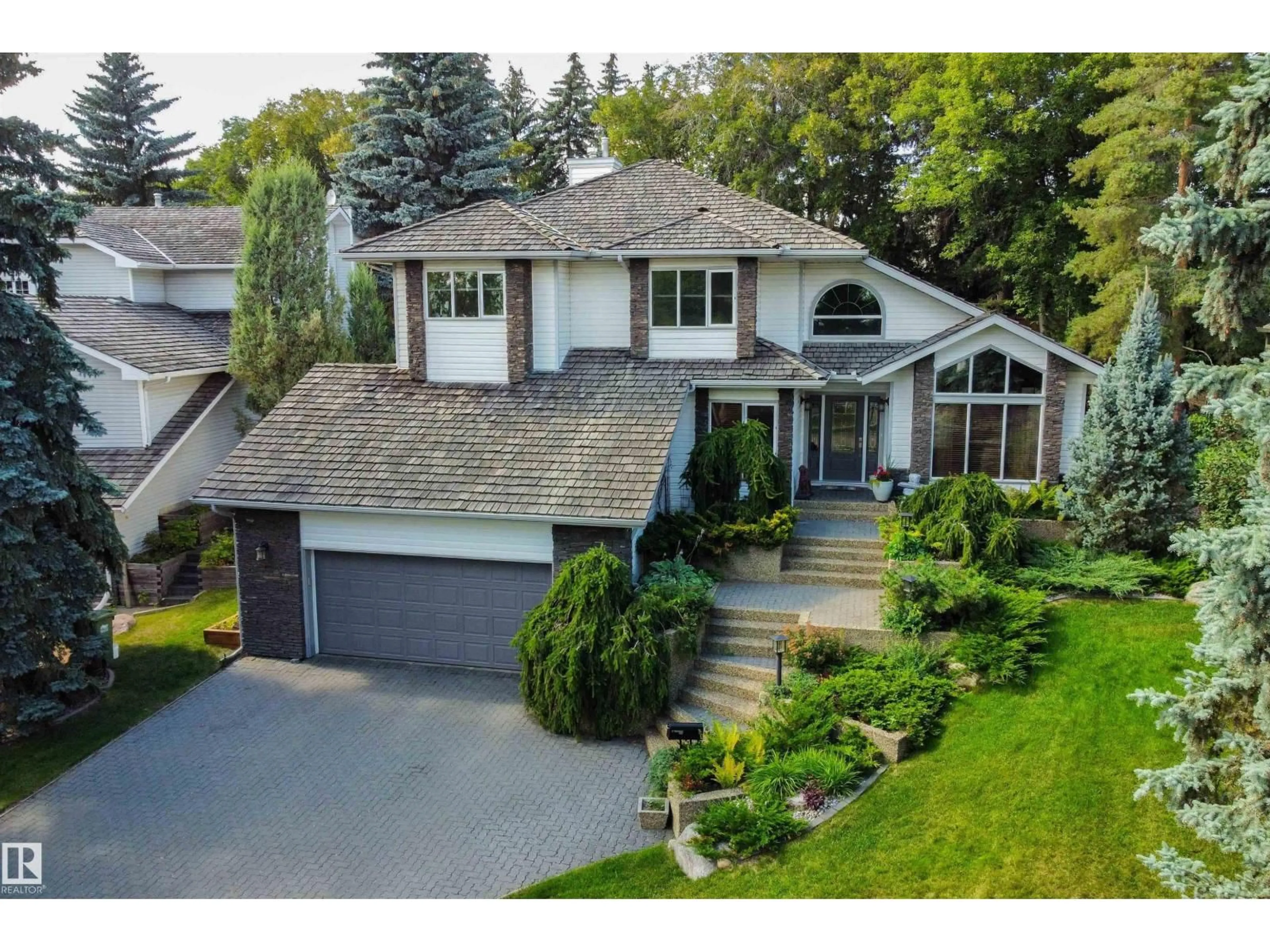 A pic from outside/outdoor area/front of a property/back of a property/a pic from drone, street for 41 IRONWOOD DR, St. Albert Alberta T8N5J2