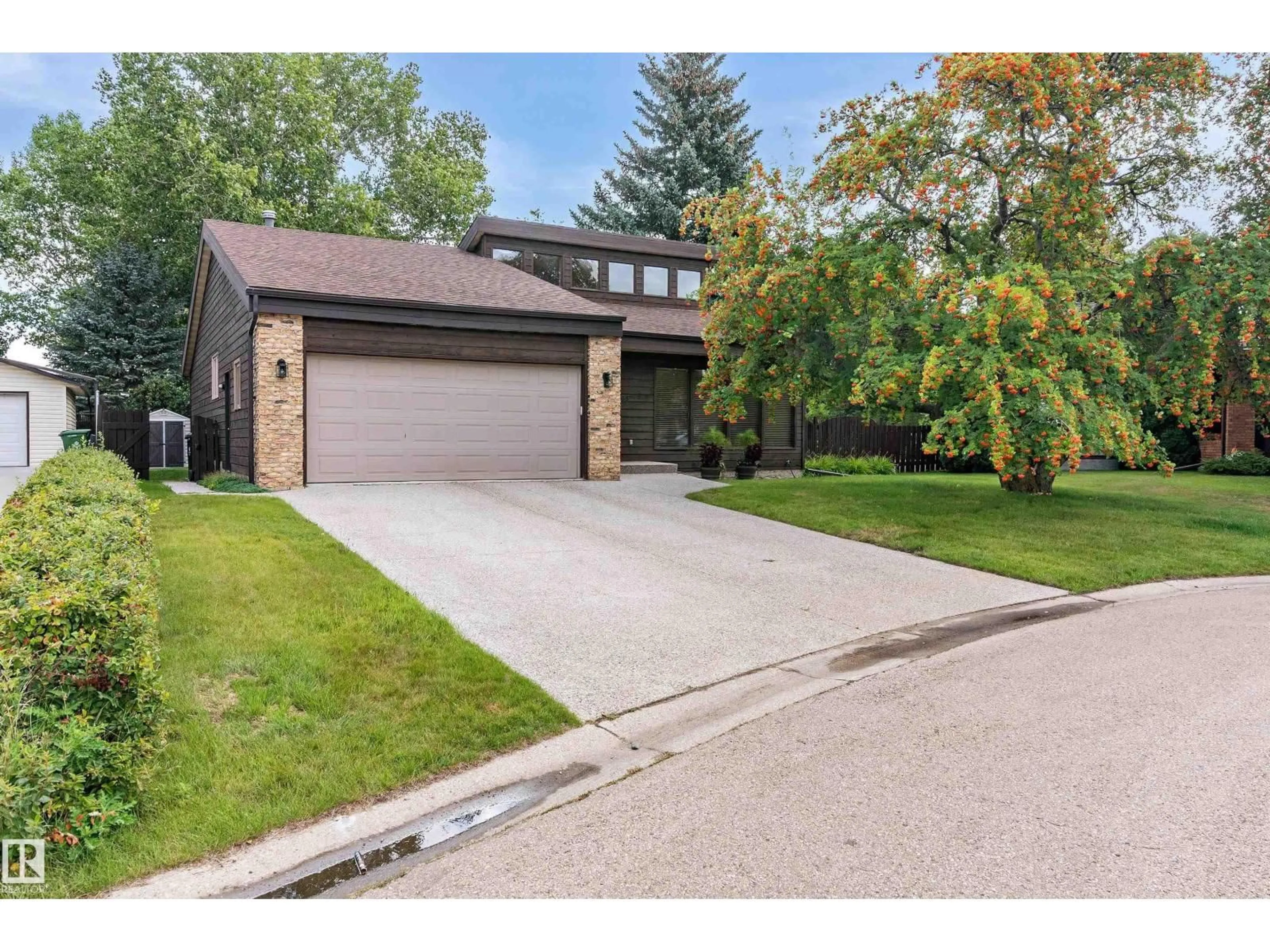 Home with brick exterior material, street for 9905 80 ST, Fort Saskatchewan Alberta T8L3H9