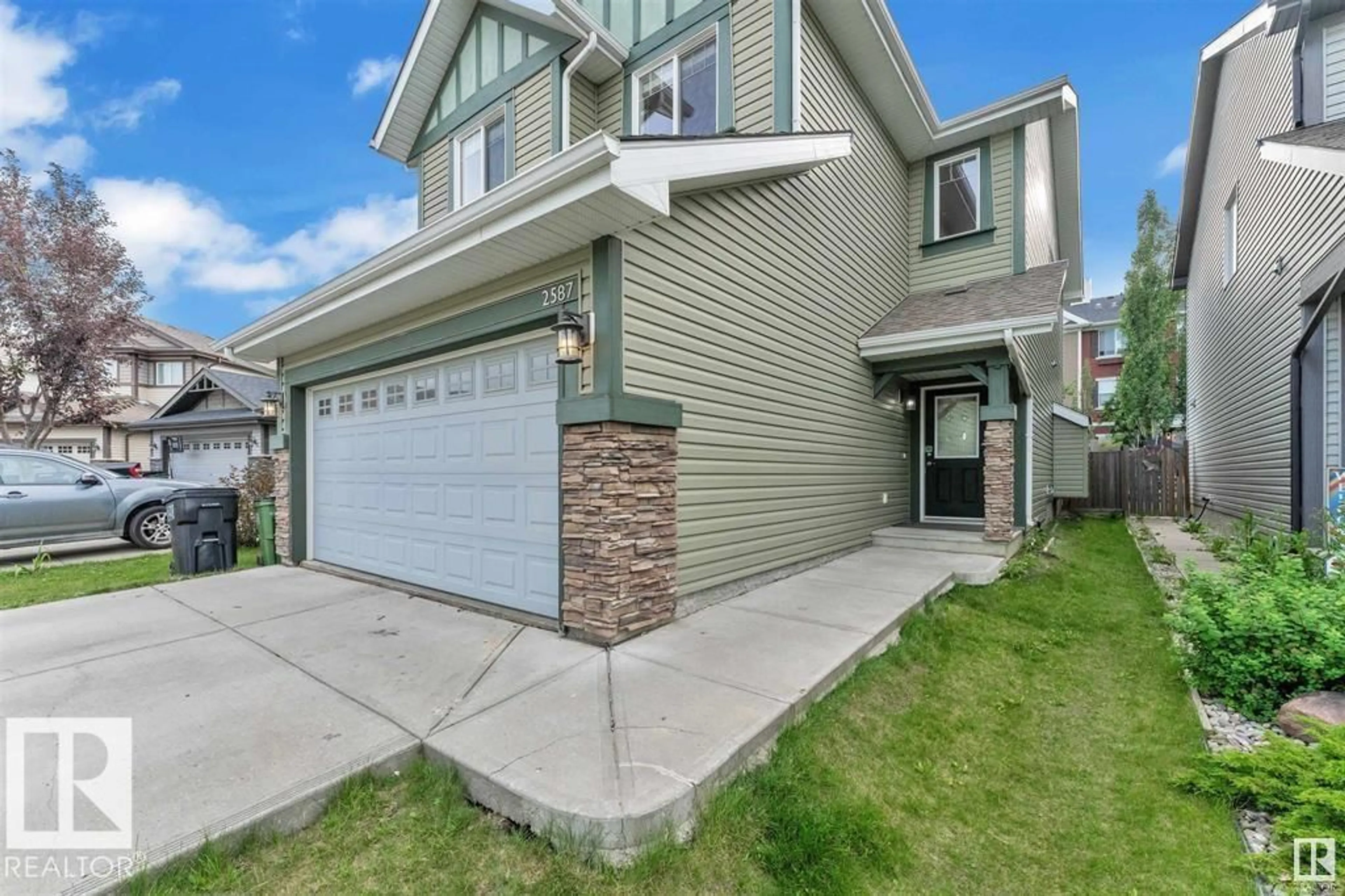Home with vinyl exterior material, street for SW - 2587 COLE CR, Edmonton Alberta T6W2A3