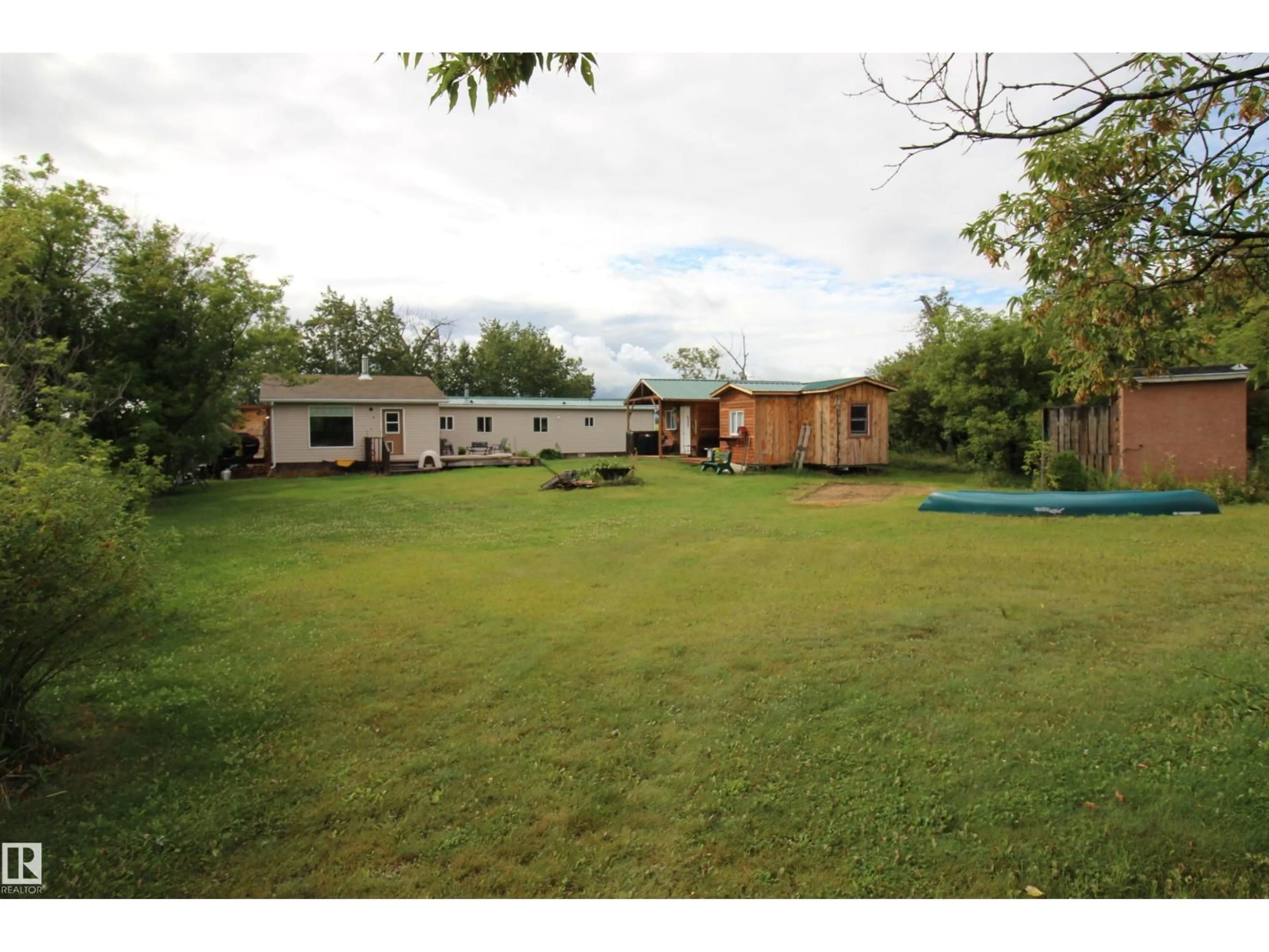 A pic from outside/outdoor area/front of a property/back of a property/a pic from drone, unknown for 58208 RGE ROAD 71, Rural Lac Ste. Anne County Alberta T0E2A0