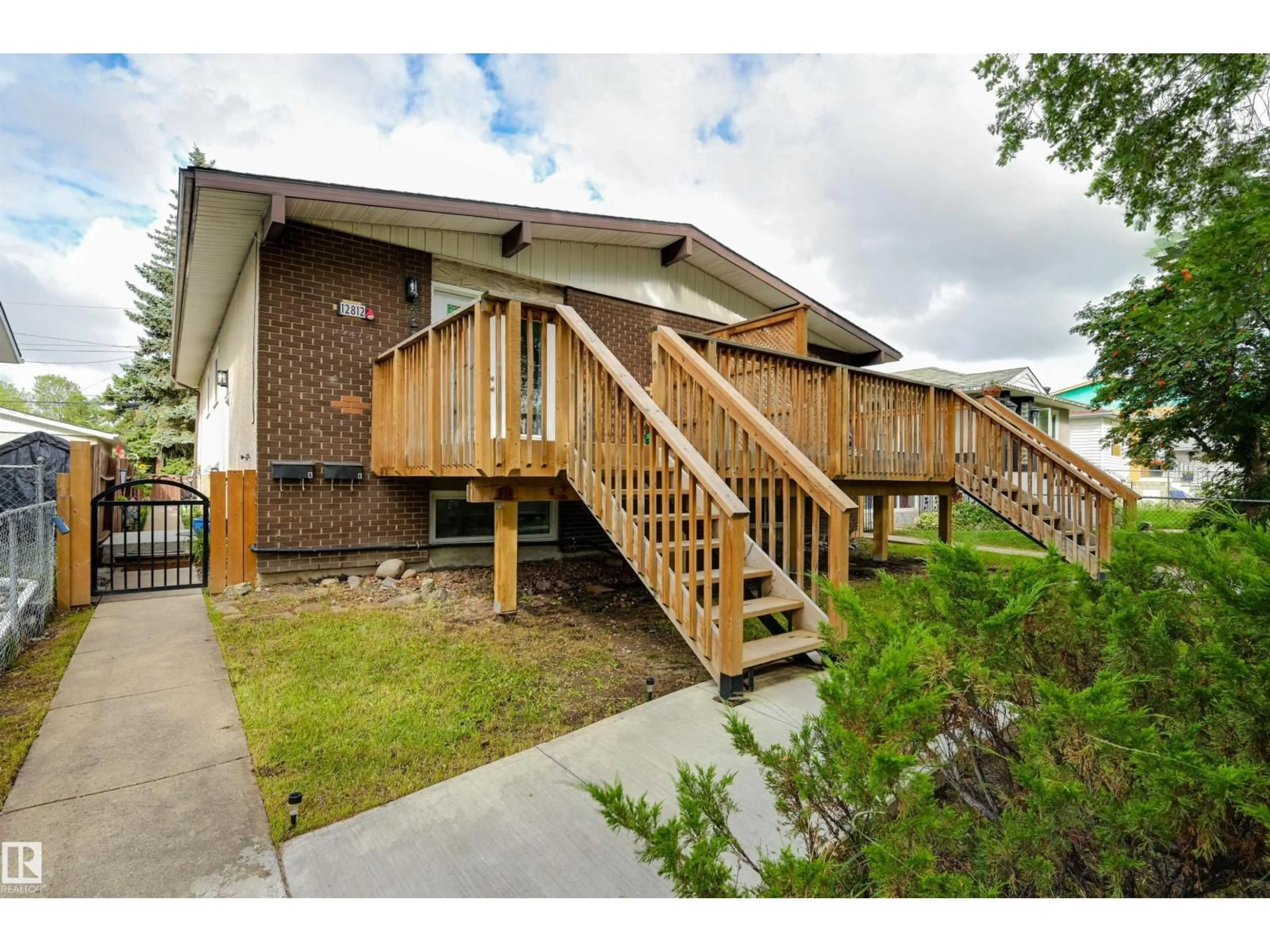 Home with brick exterior material, street for NW - 12812 +12814 125 ST, Edmonton Alberta T5L0T9