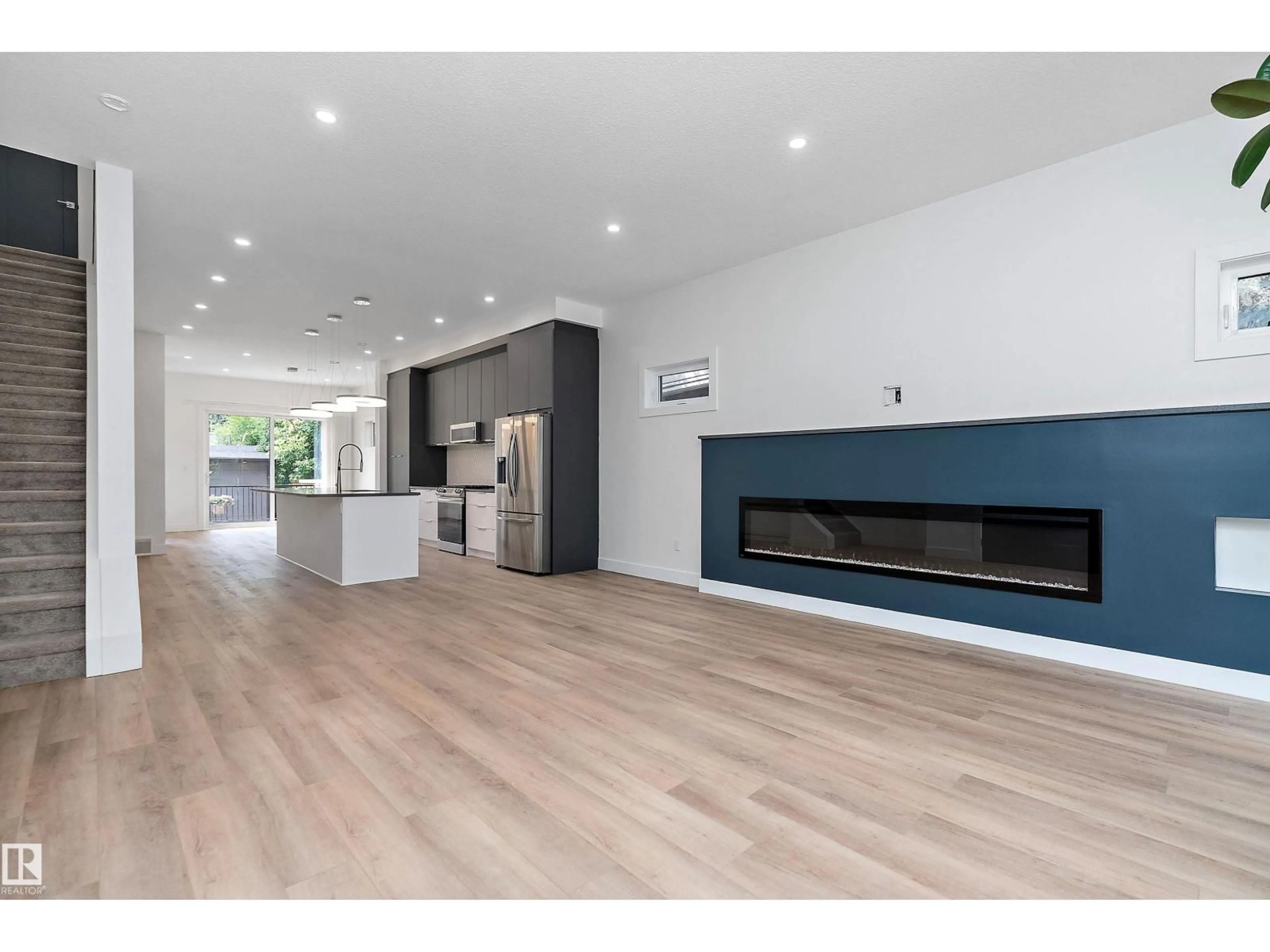 Open concept kitchen, wood/laminate floor for NW - 10334 146 ST, Edmonton Alberta T5N3A2