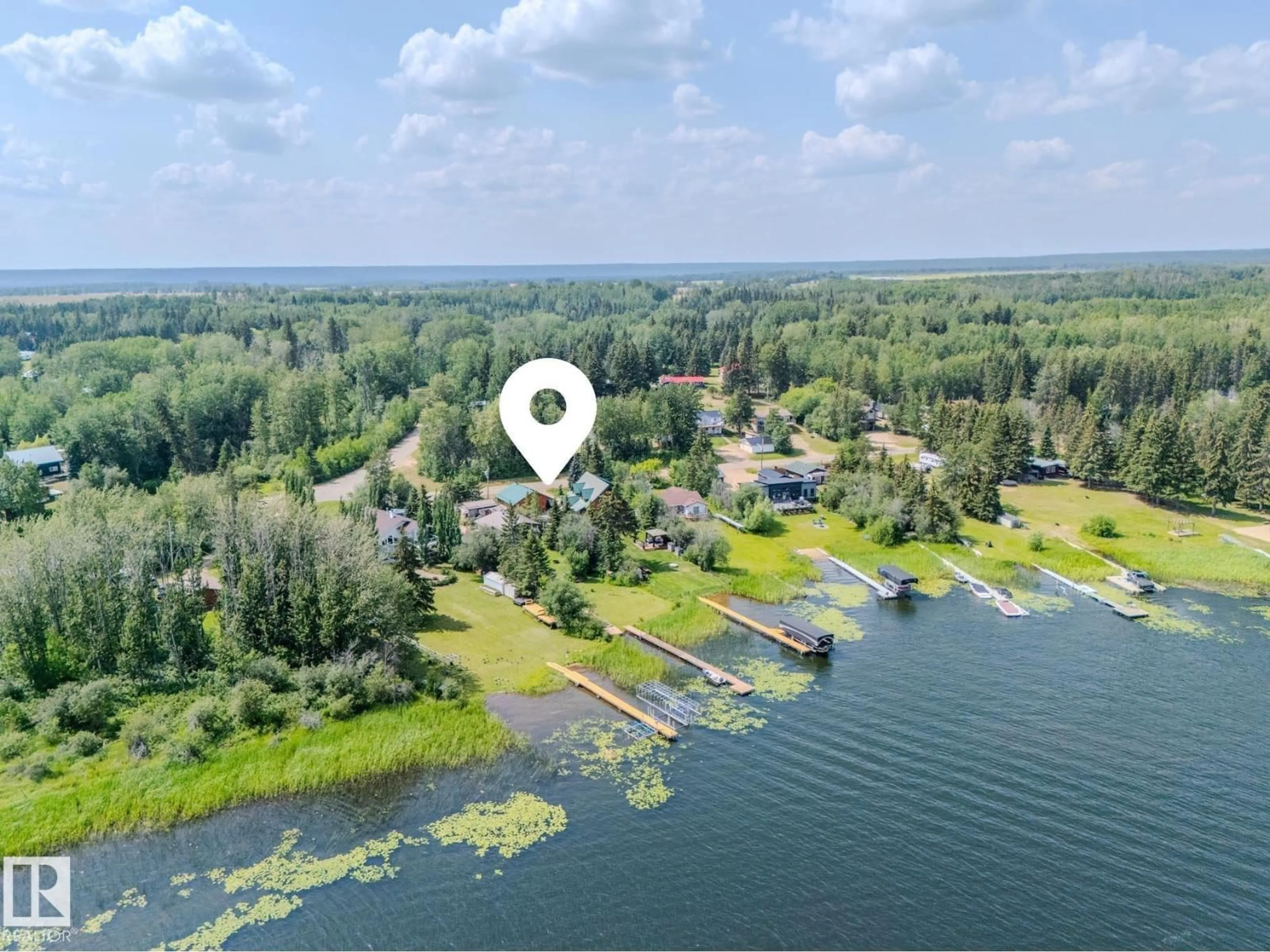 A pic from outside/outdoor area/front of a property/back of a property/a pic from drone, water/lake/river/ocean view for 213 LAKESHORE DR, Rural Athabasca County Alberta T9S1C4