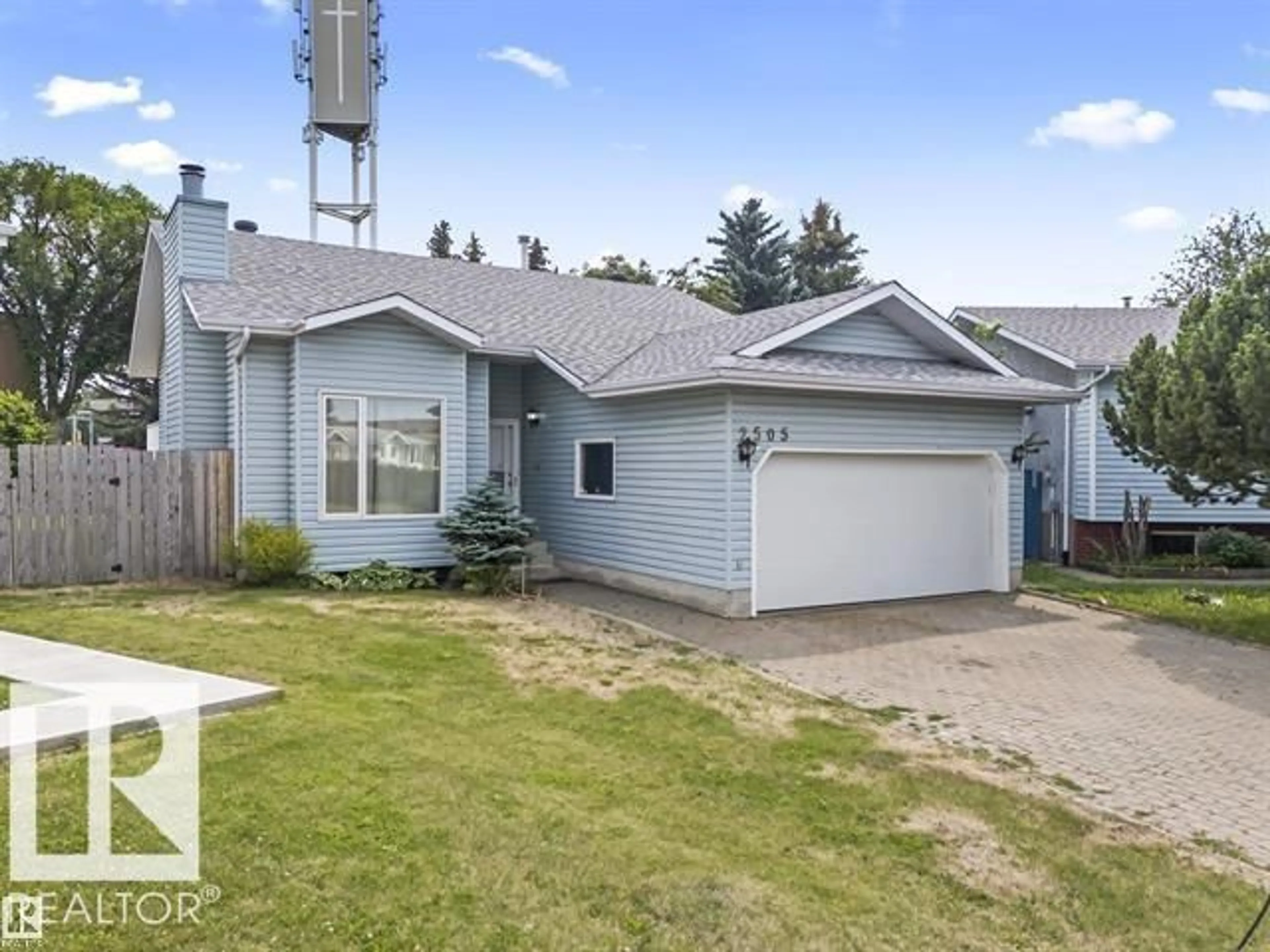 Home with vinyl exterior material, street for NW - 2505 38A ST, Edmonton Alberta T6L4L6