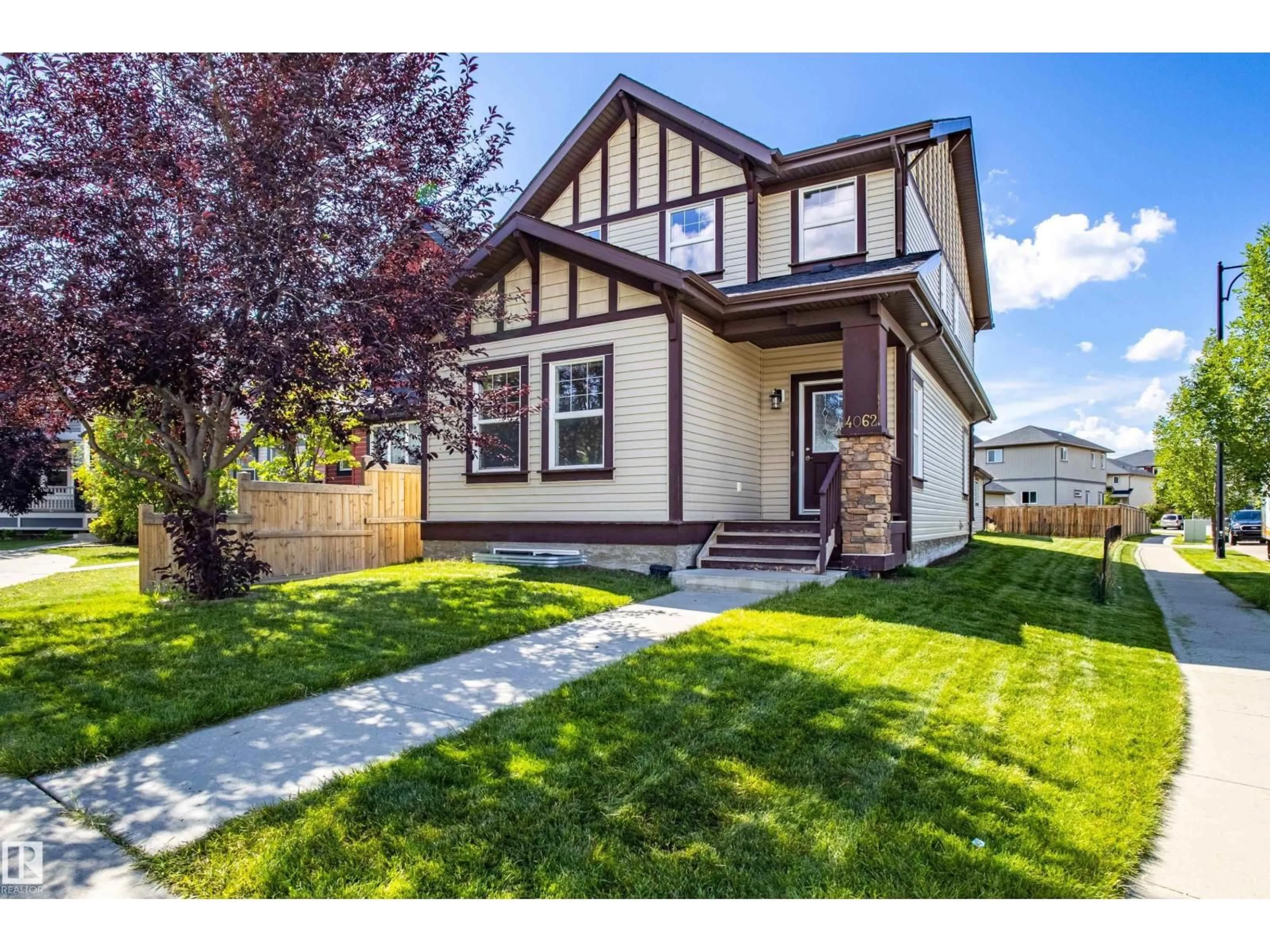 Home with vinyl exterior material, street for 4062 ALEXANDER WY, Edmonton Alberta T6W2C6