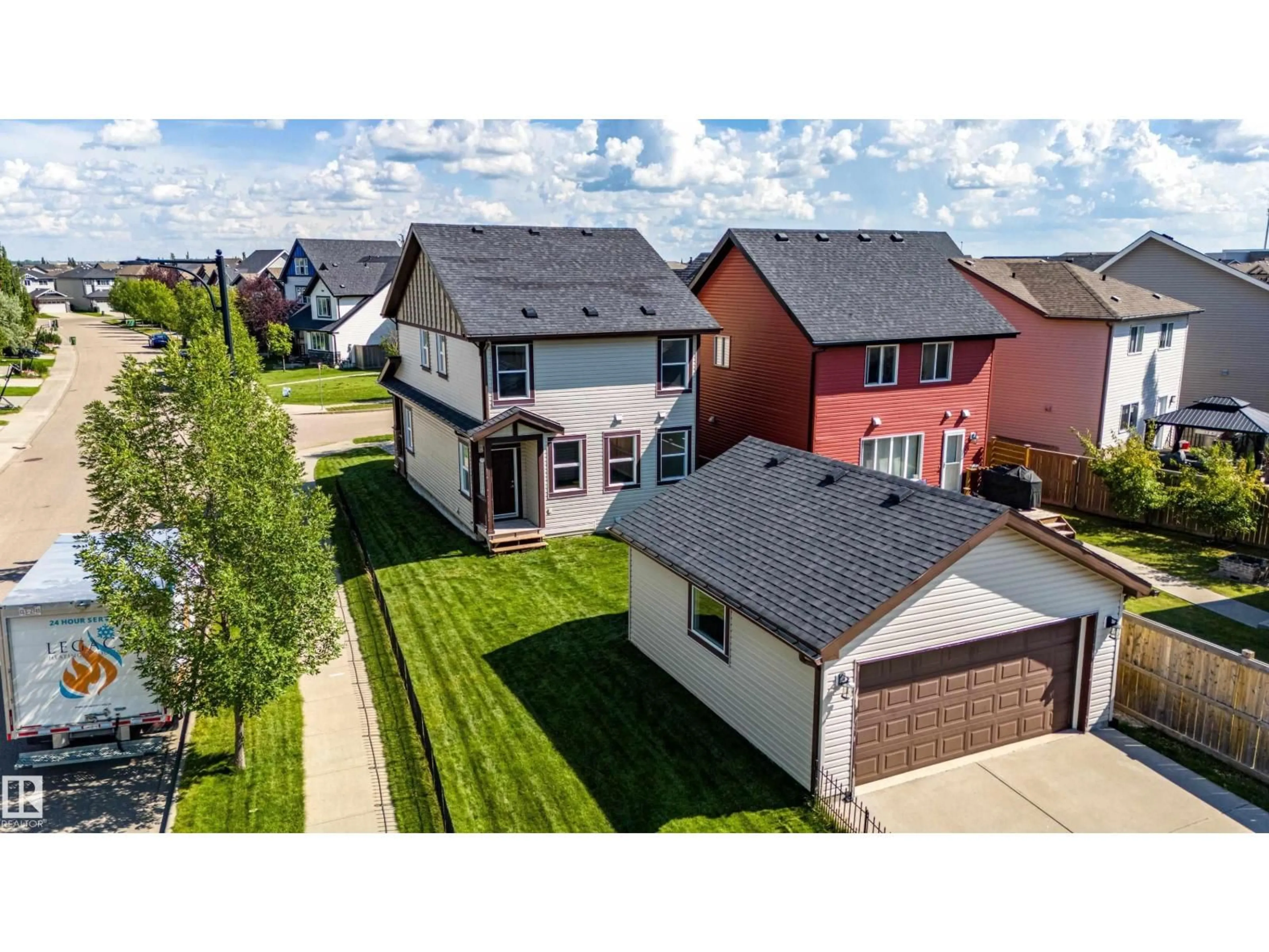 A pic from outside/outdoor area/front of a property/back of a property/a pic from drone, street for 4062 ALEXANDER WY, Edmonton Alberta T6W2C6