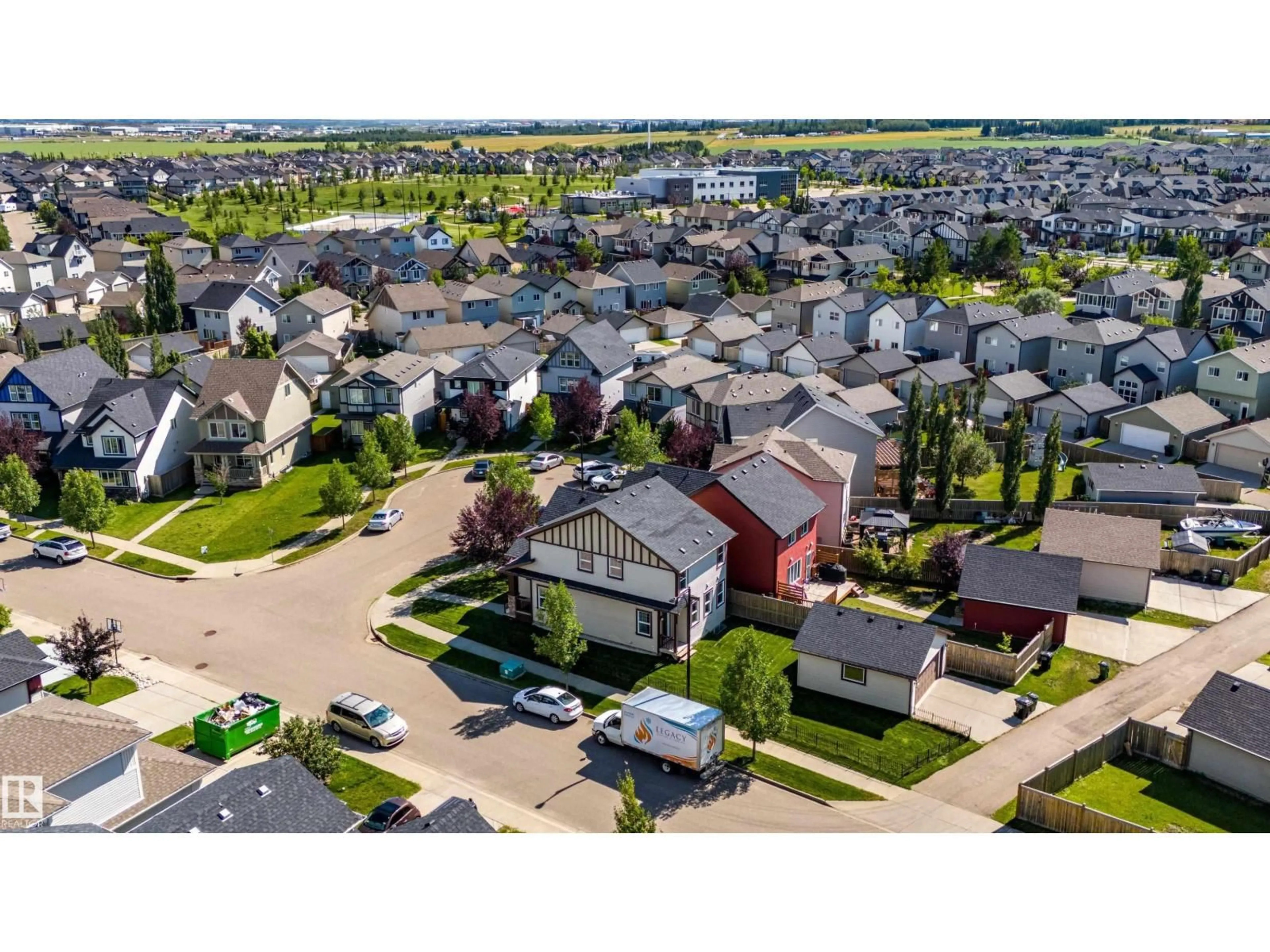 A pic from outside/outdoor area/front of a property/back of a property/a pic from drone, street for 4062 ALEXANDER WY, Edmonton Alberta T6W2C6