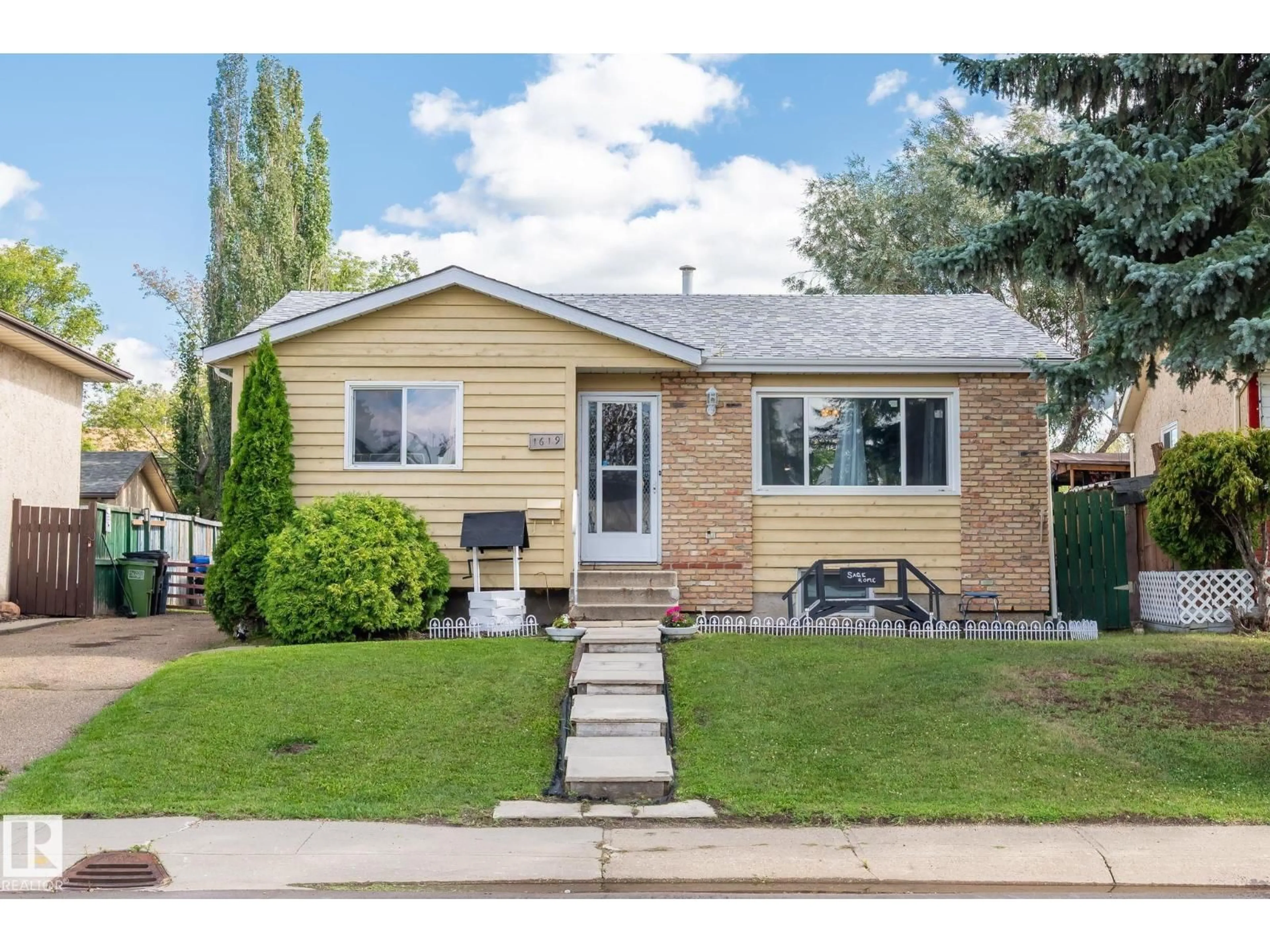 Home with vinyl exterior material, street for NW - 1619 42 ST, Edmonton Alberta T6L2R8