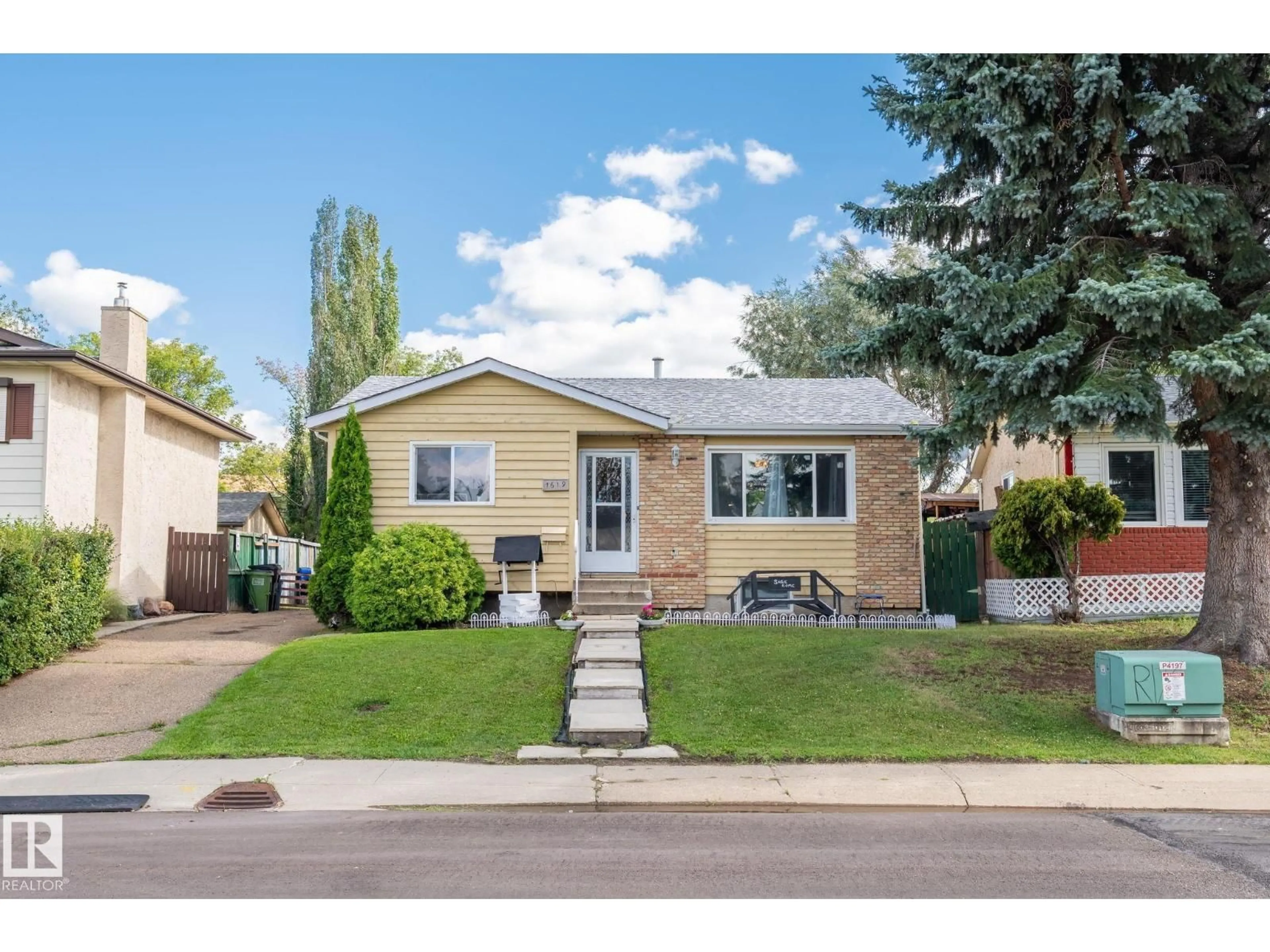 Home with vinyl exterior material, street for NW - 1619 42 ST, Edmonton Alberta T6L2R8
