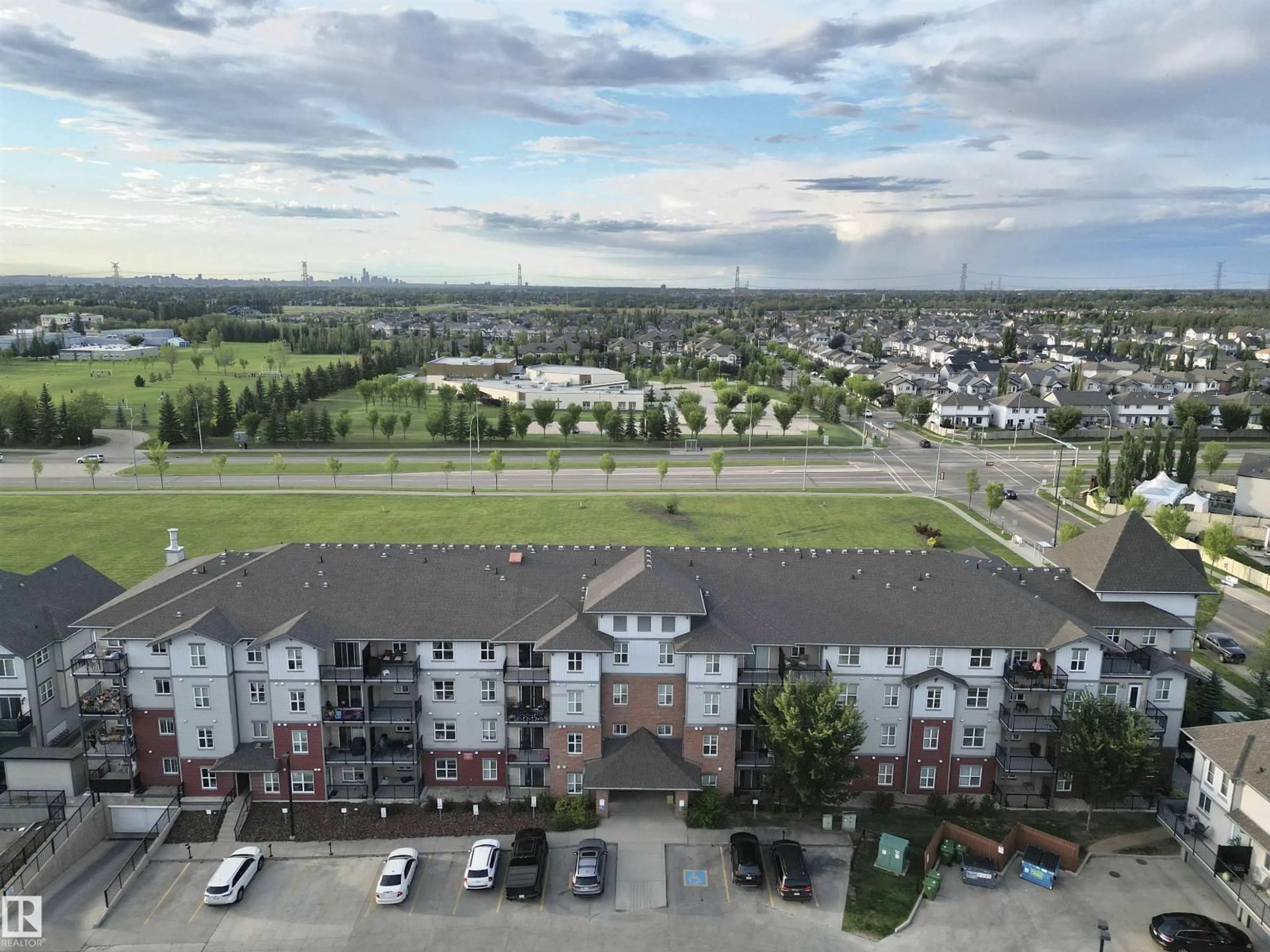 A pic from outside/outdoor area/front of a property/back of a property/a pic from drone, city buildings view from balcony for 206 WATT BV, Edmonton Alberta T6X0Y2