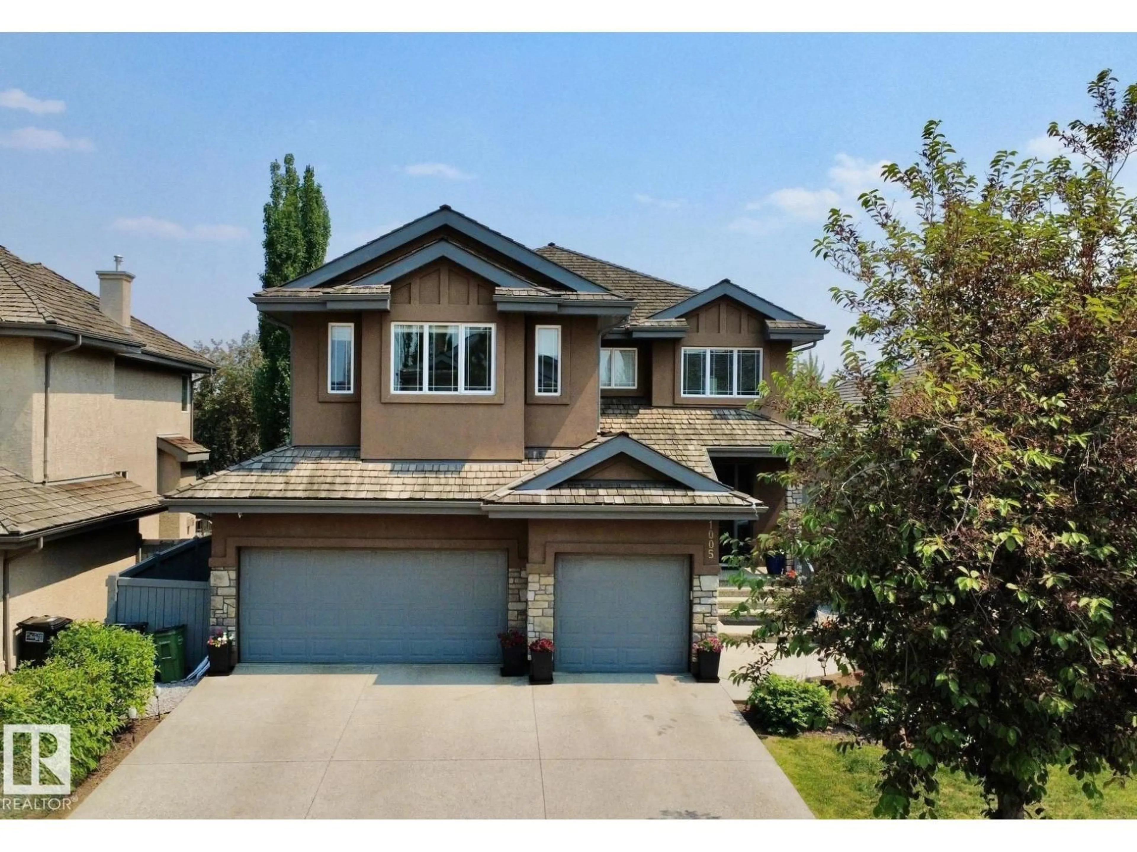 A pic from outside/outdoor area/front of a property/back of a property/a pic from drone, street for 1005 DOWNEY WY, Edmonton Alberta T6M2V4