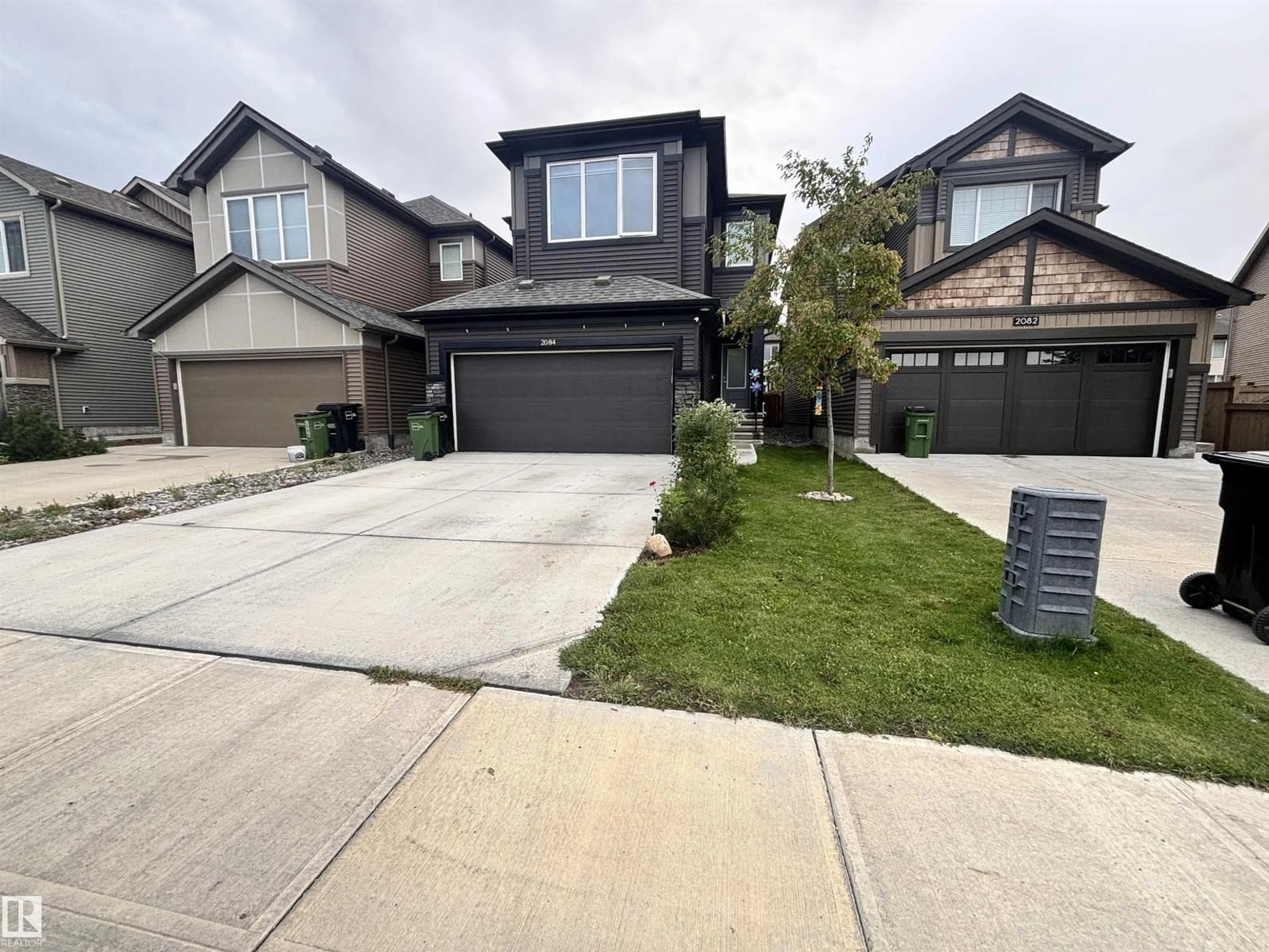 A pic from outside/outdoor area/front of a property/back of a property/a pic from drone, street for SW - 2084 GRAYDON HILL CR, Edmonton Alberta T6W4C7