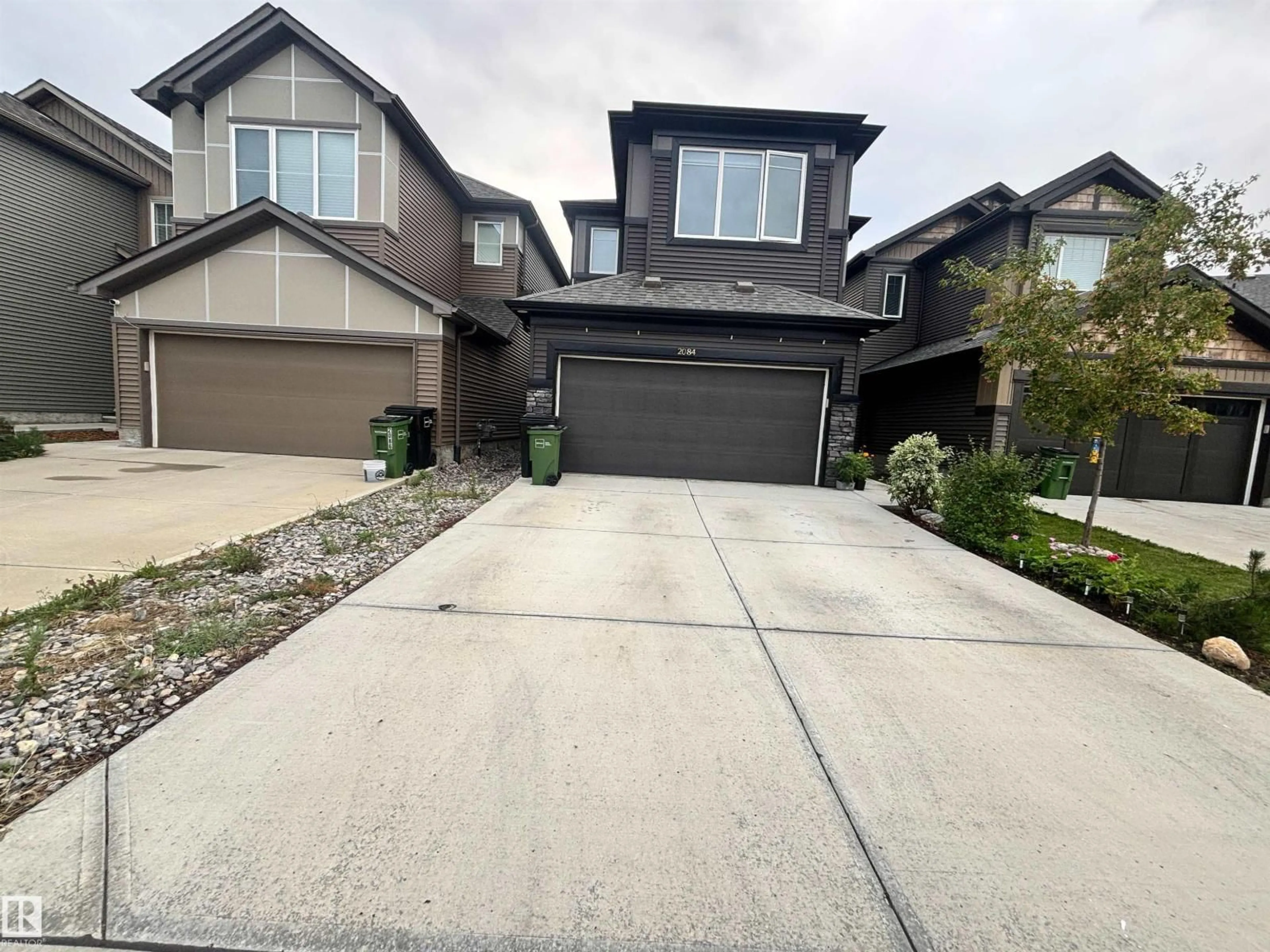 A pic from outside/outdoor area/front of a property/back of a property/a pic from drone, street for SW - 2084 GRAYDON HILL CR, Edmonton Alberta T6W4C7