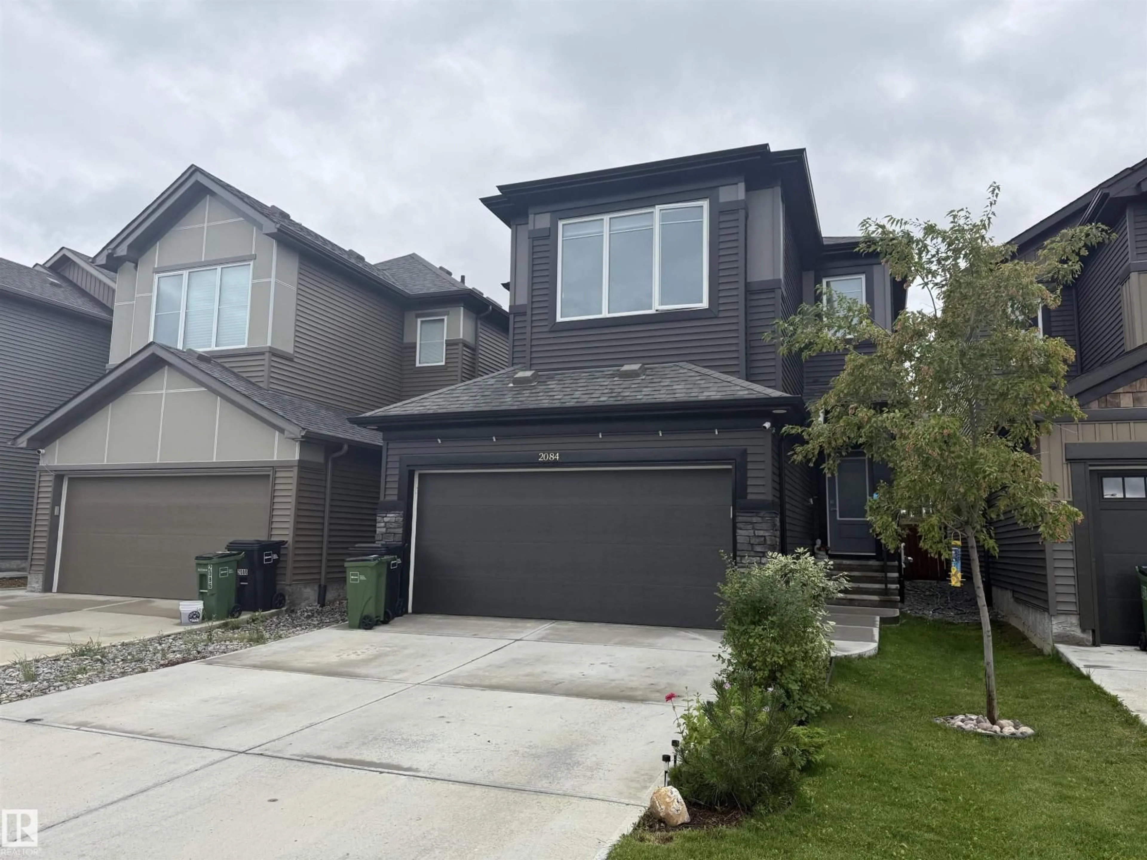 Home with vinyl exterior material, street for SW - 2084 GRAYDON HILL CR, Edmonton Alberta T6W4C7