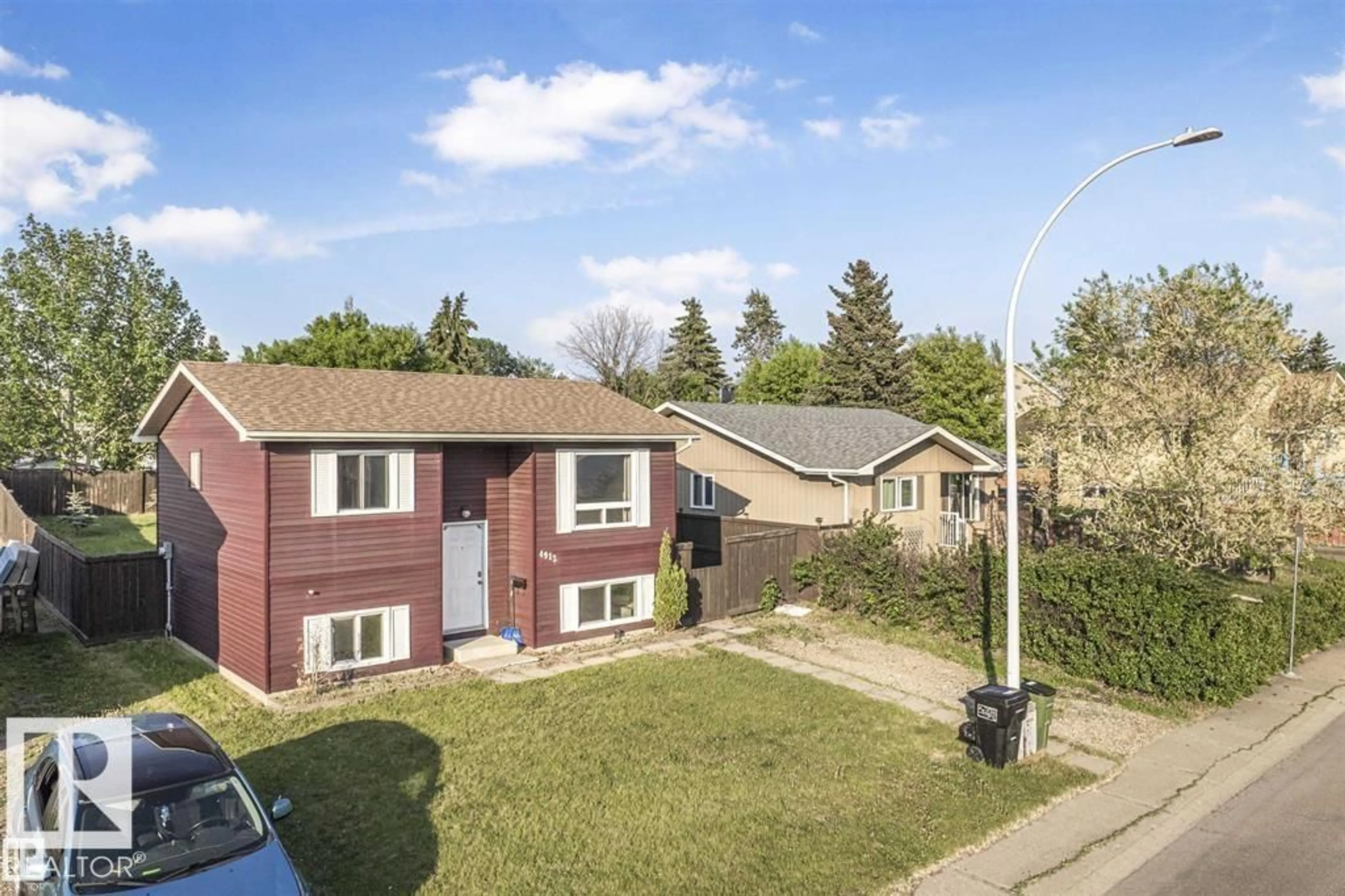 A pic from outside/outdoor area/front of a property/back of a property/a pic from drone, street for 4912 36 AV, Edmonton Alberta T6L3S5