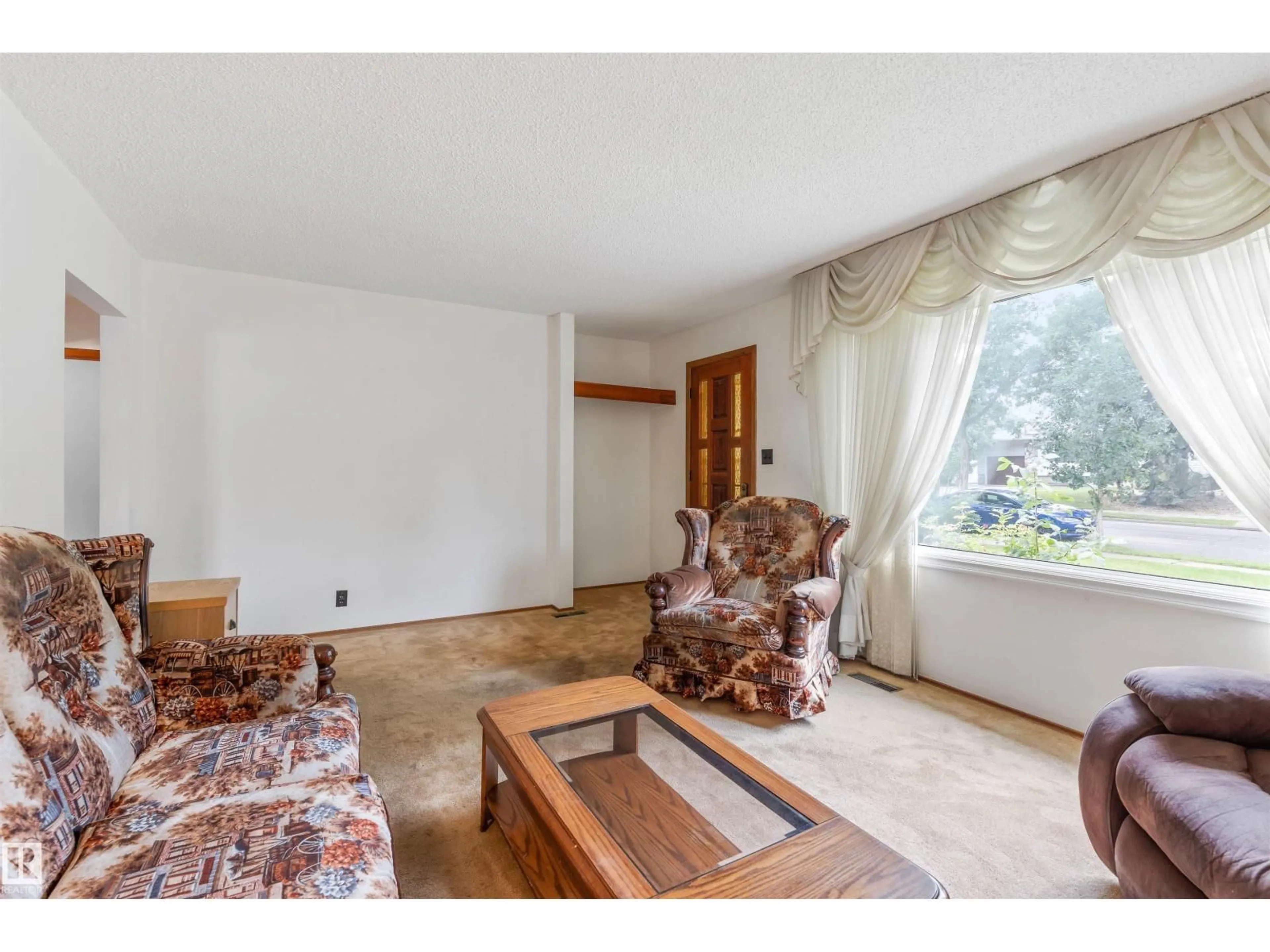 Living room with furniture, unknown for NW - 11835 45 ST, Edmonton Alberta T5W2T3