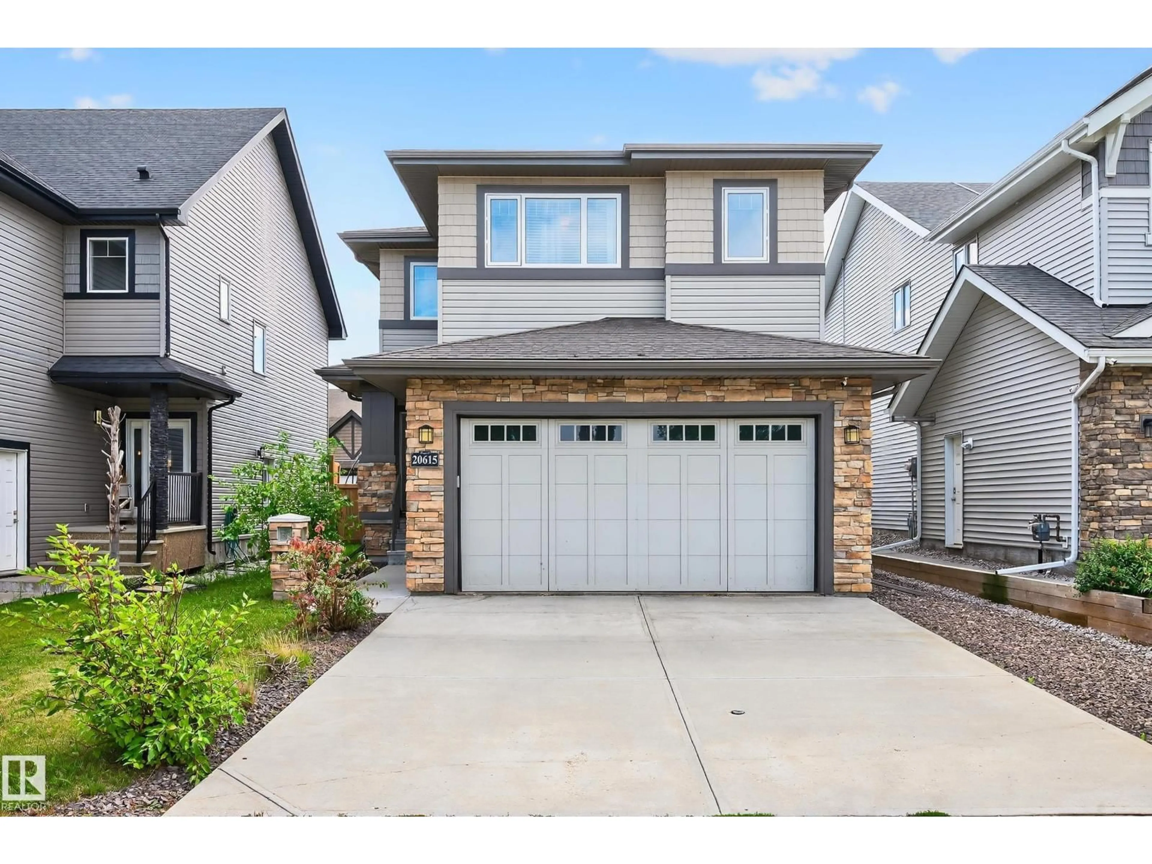 Home with brick exterior material, street for NW - 20615 130 AV, Edmonton Alberta T5S0J4