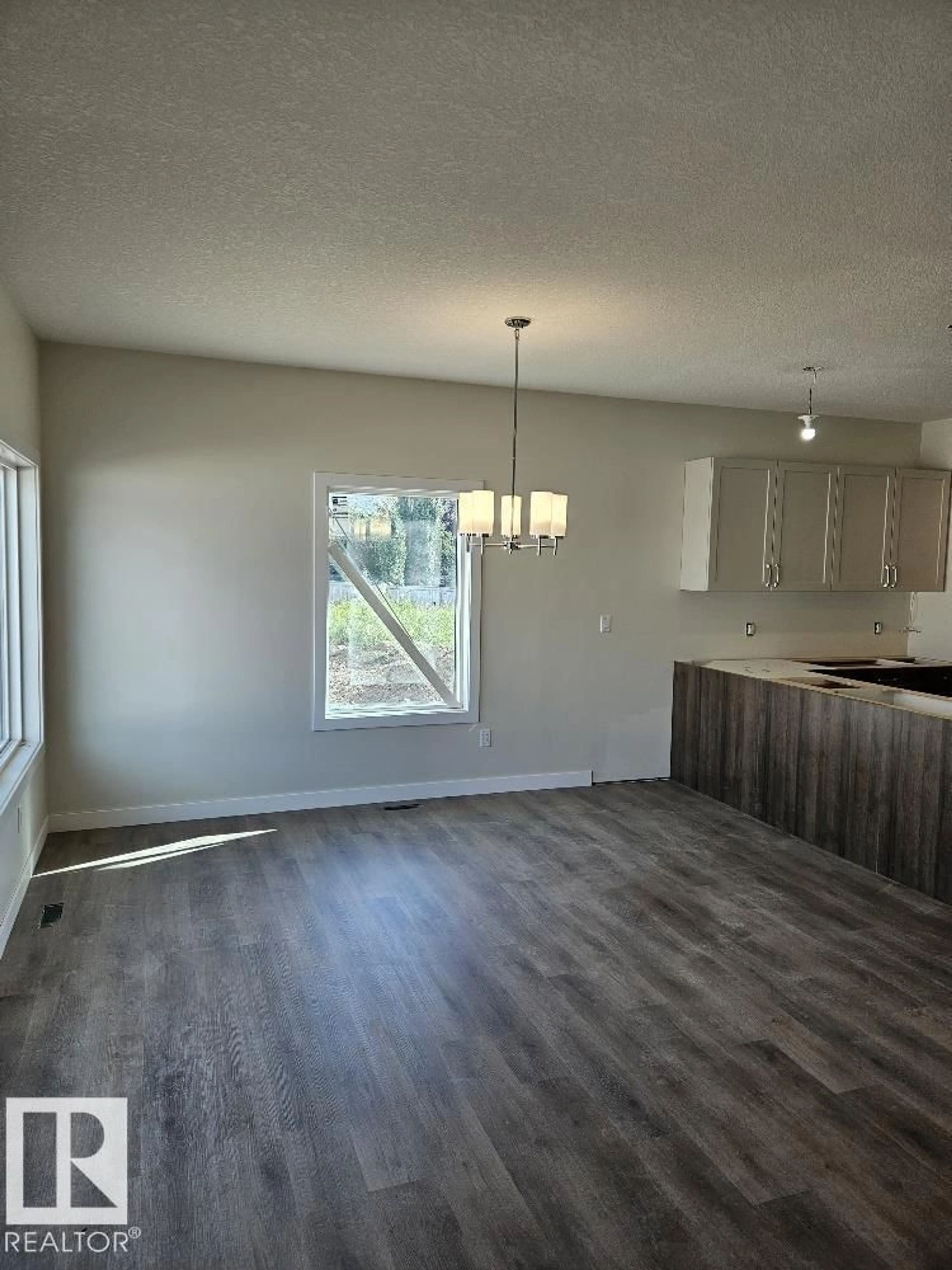 Open concept kitchen, wood/laminate floor for 11 - 42 DALTON LI, Spruce Grove Alberta T7X4C4