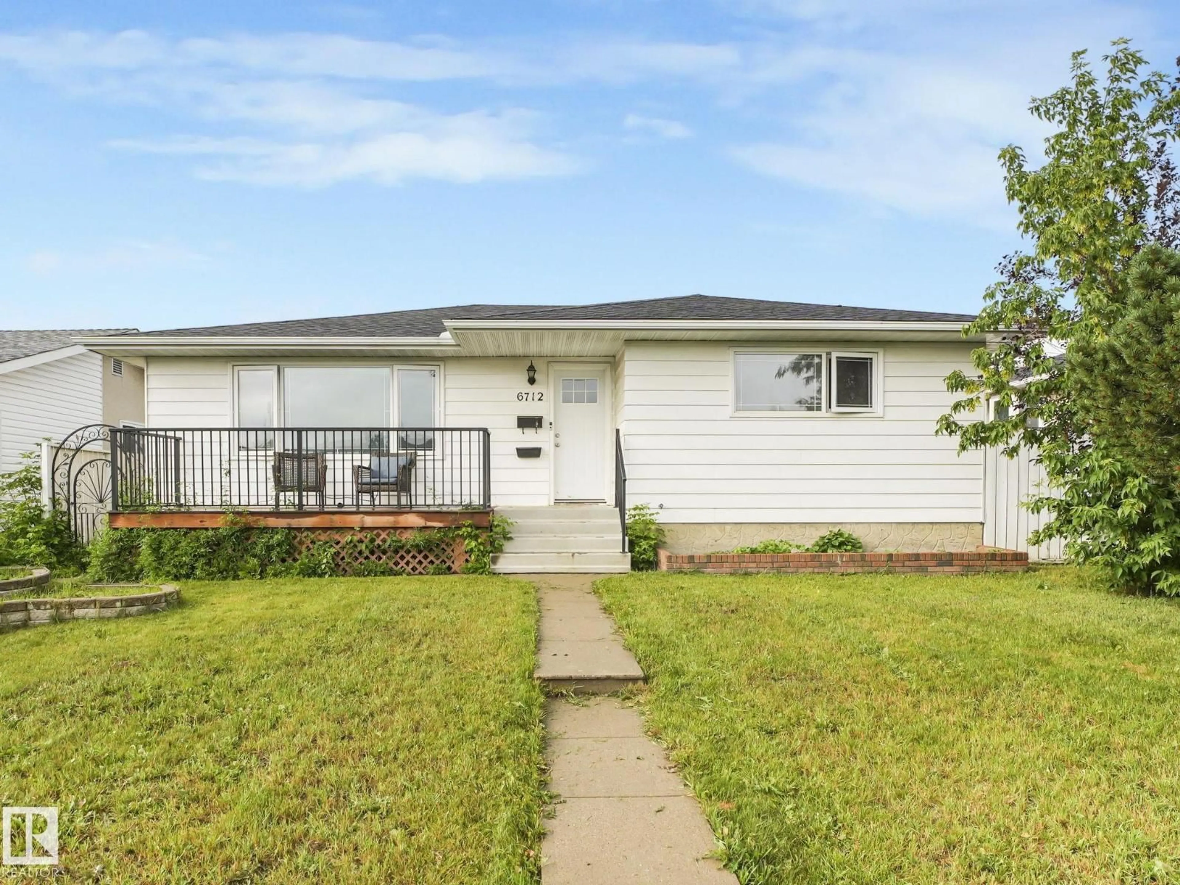 Home with vinyl exterior material, street for 6712 149A AV, Edmonton Alberta T5C2V9