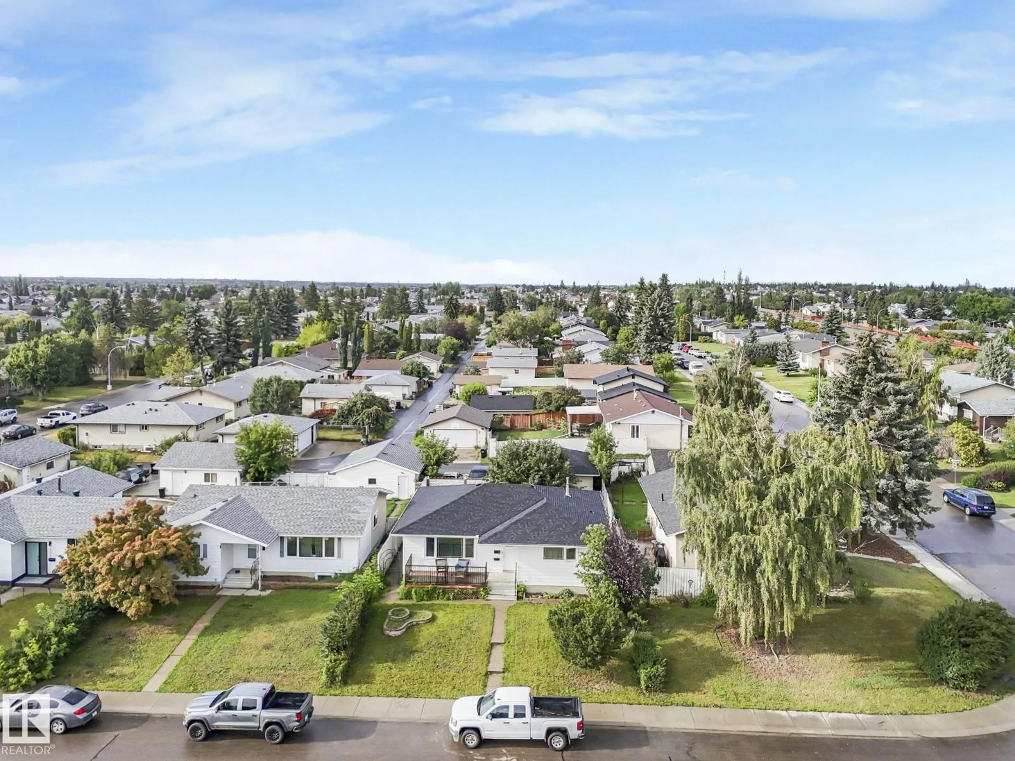 A pic from outside/outdoor area/front of a property/back of a property/a pic from drone, street for 6712 149A AV, Edmonton Alberta T5C2V9